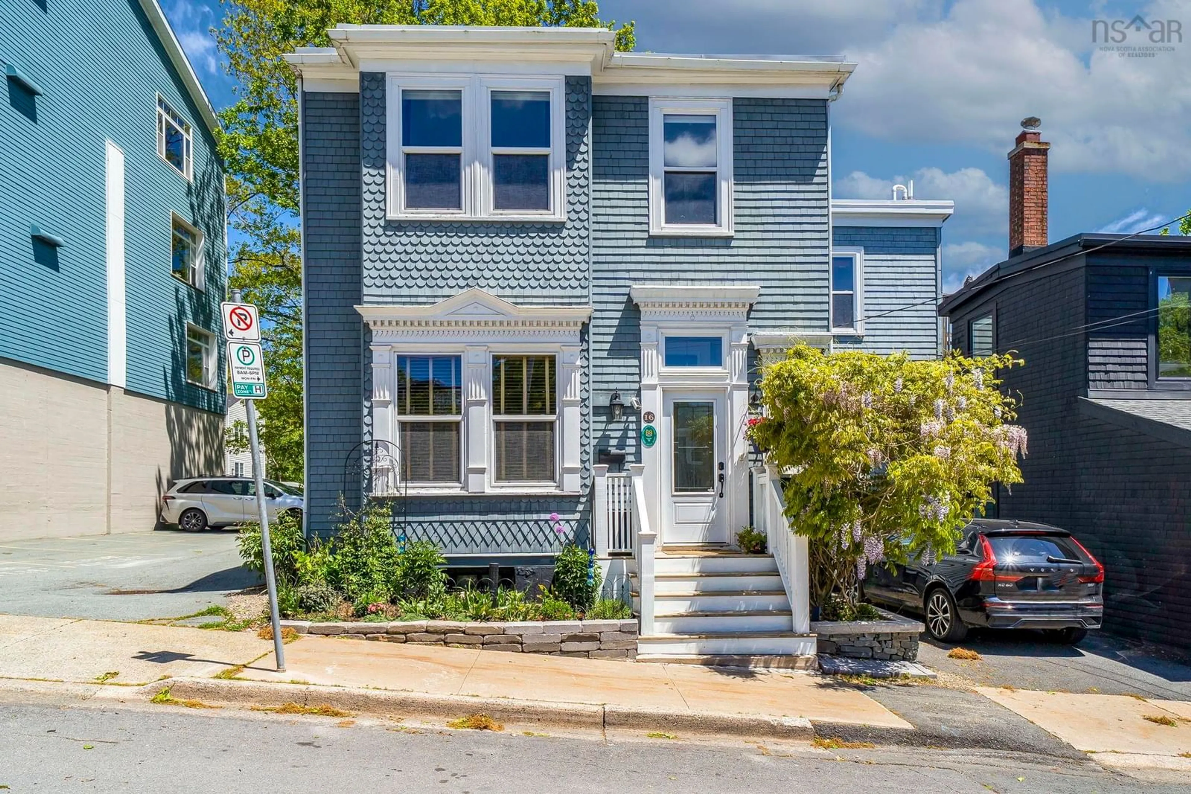 Home with vinyl exterior material, street for 16 Victoria Rd, Dartmouth Nova Scotia B2Y 2V6