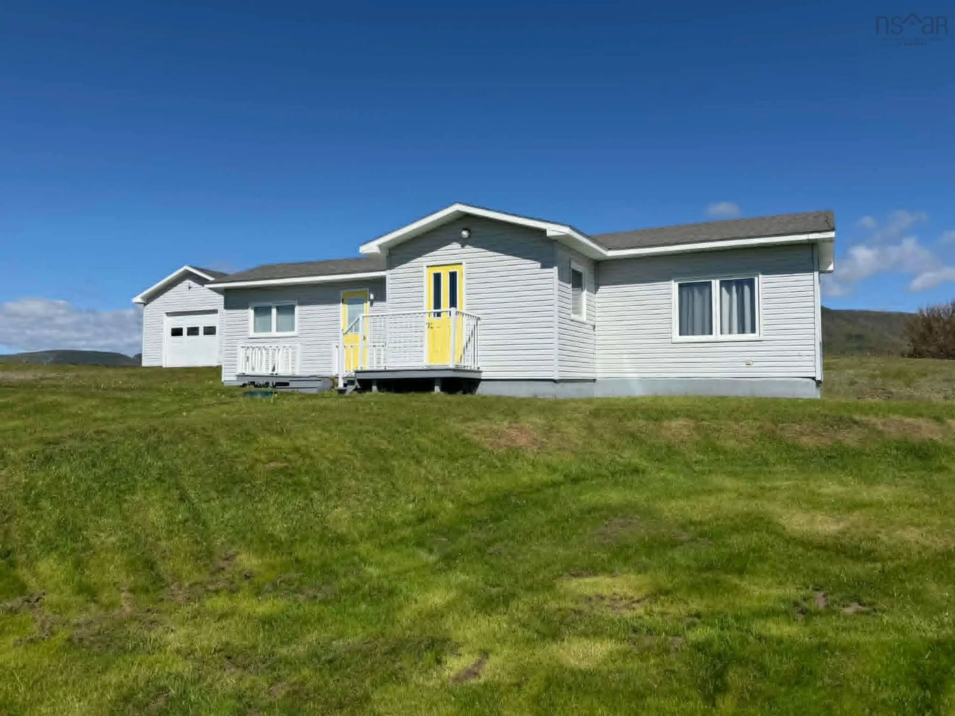 Home with vinyl exterior material, building for 12898 Cabot Trail, Grand Étang Nova Scotia B0E 1L0