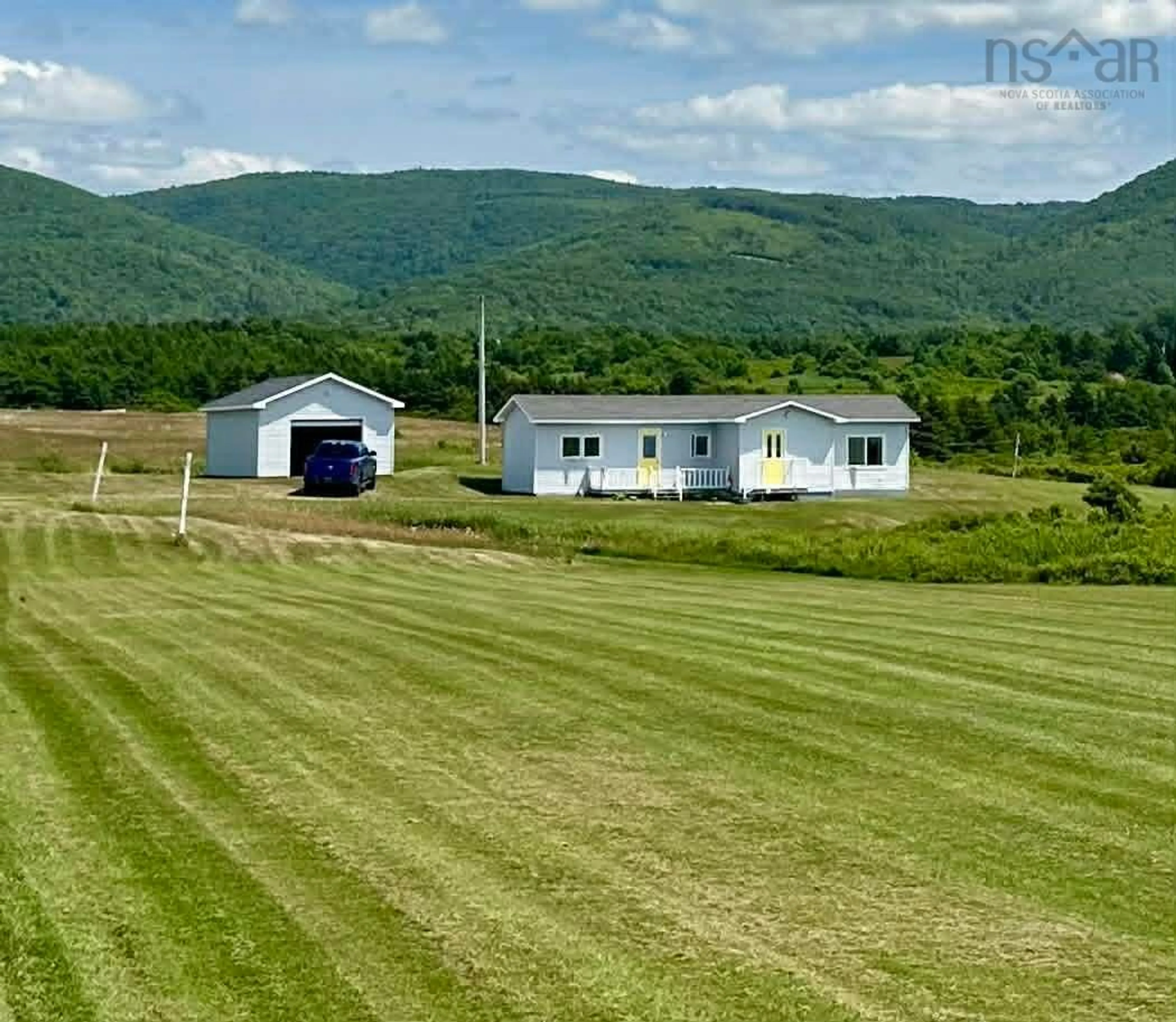 A pic from outside/outdoor area/front of a property/back of a property/a pic from drone, mountain view for 12898 Cabot Trail, Grand Étang Nova Scotia B0E 1L0