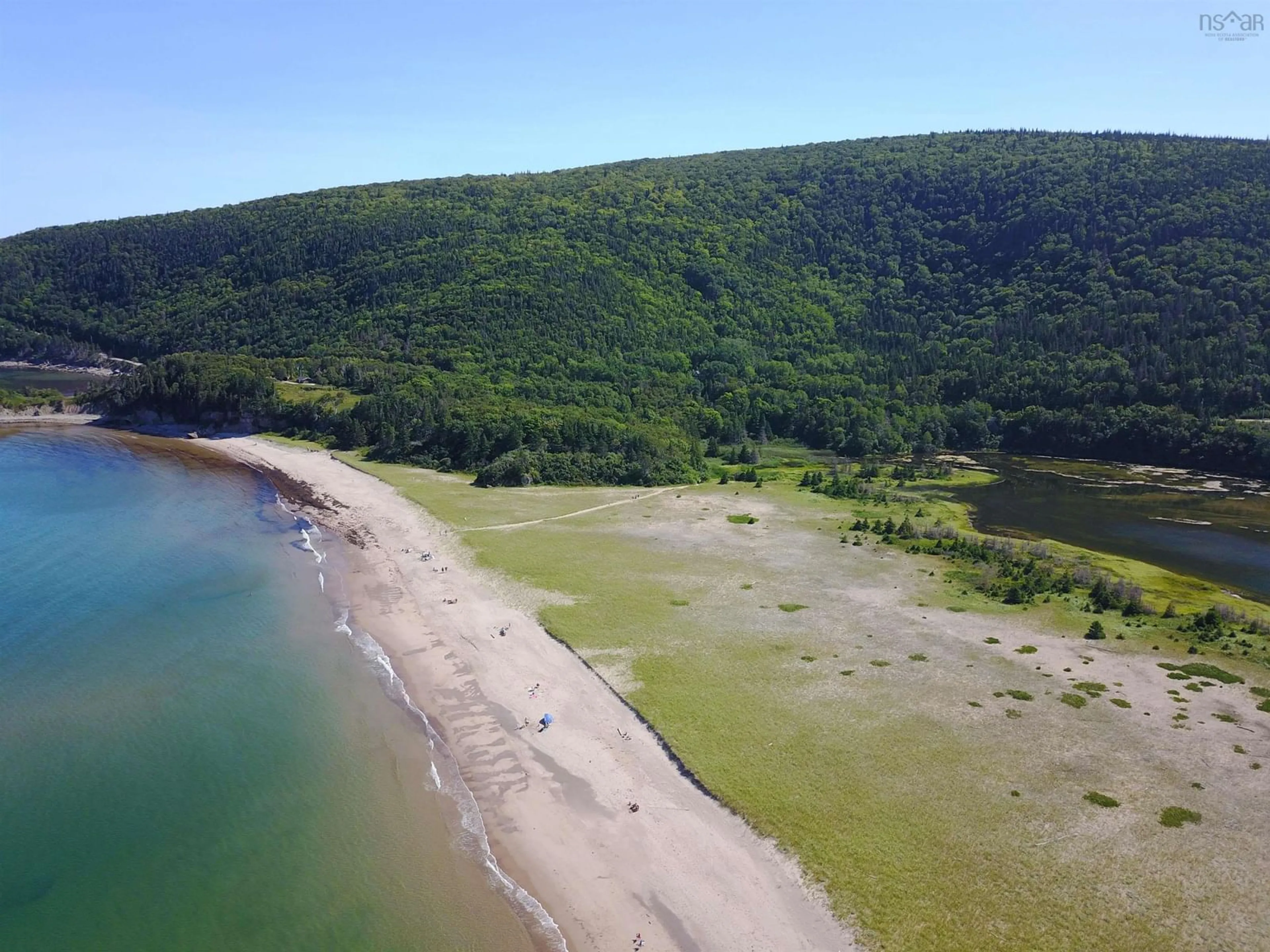 A pic from outside/outdoor area/front of a property/back of a property/a pic from drone, water/lake/river/ocean view for 659 White Point Rd, South Harbour Nova Scotia B0C 1G0