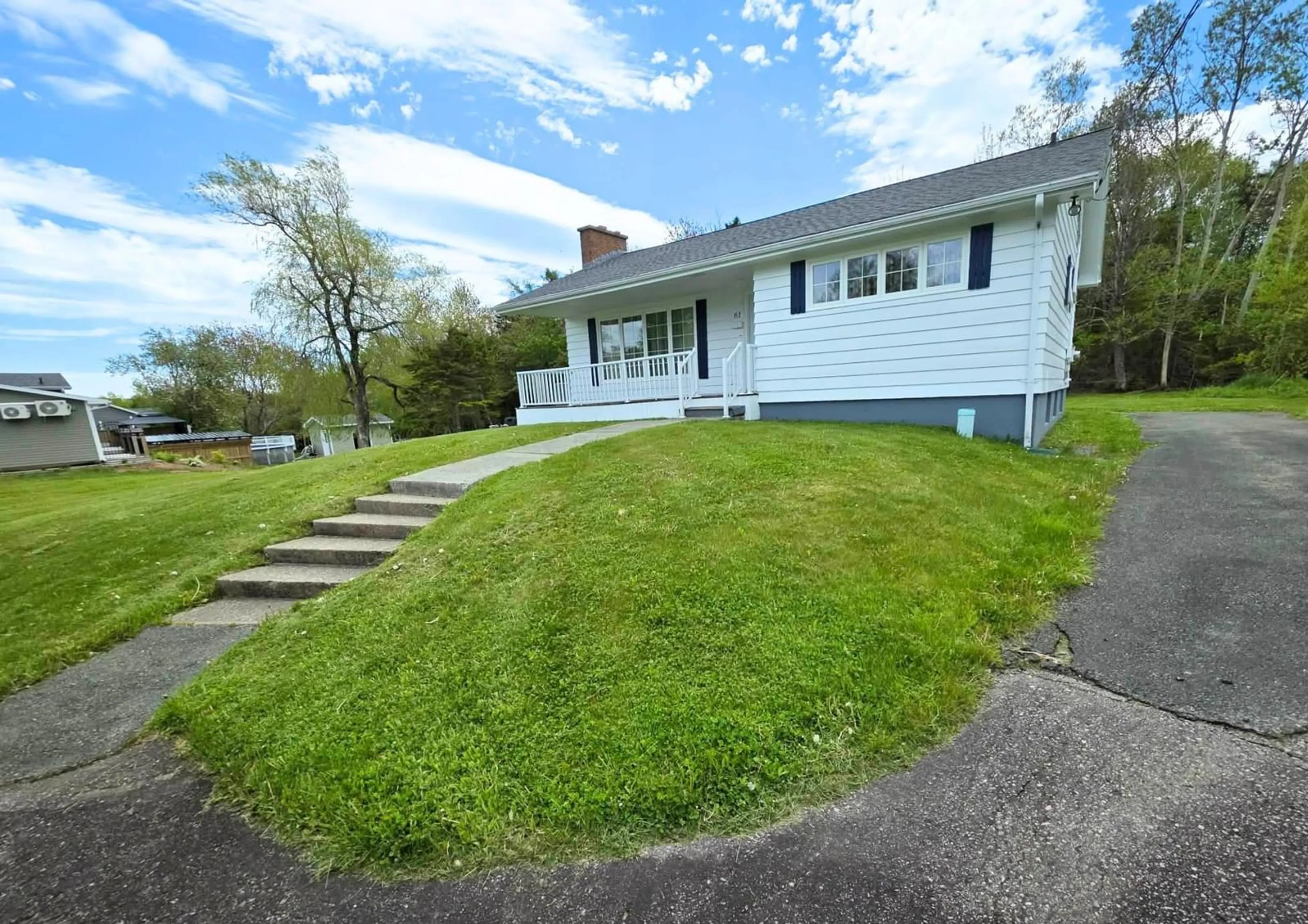 A pic from outside/outdoor area/front of a property/back of a property/a pic from drone, unknown for 61 Braemar Dr, Westmount Nova Scotia B1R 1W1