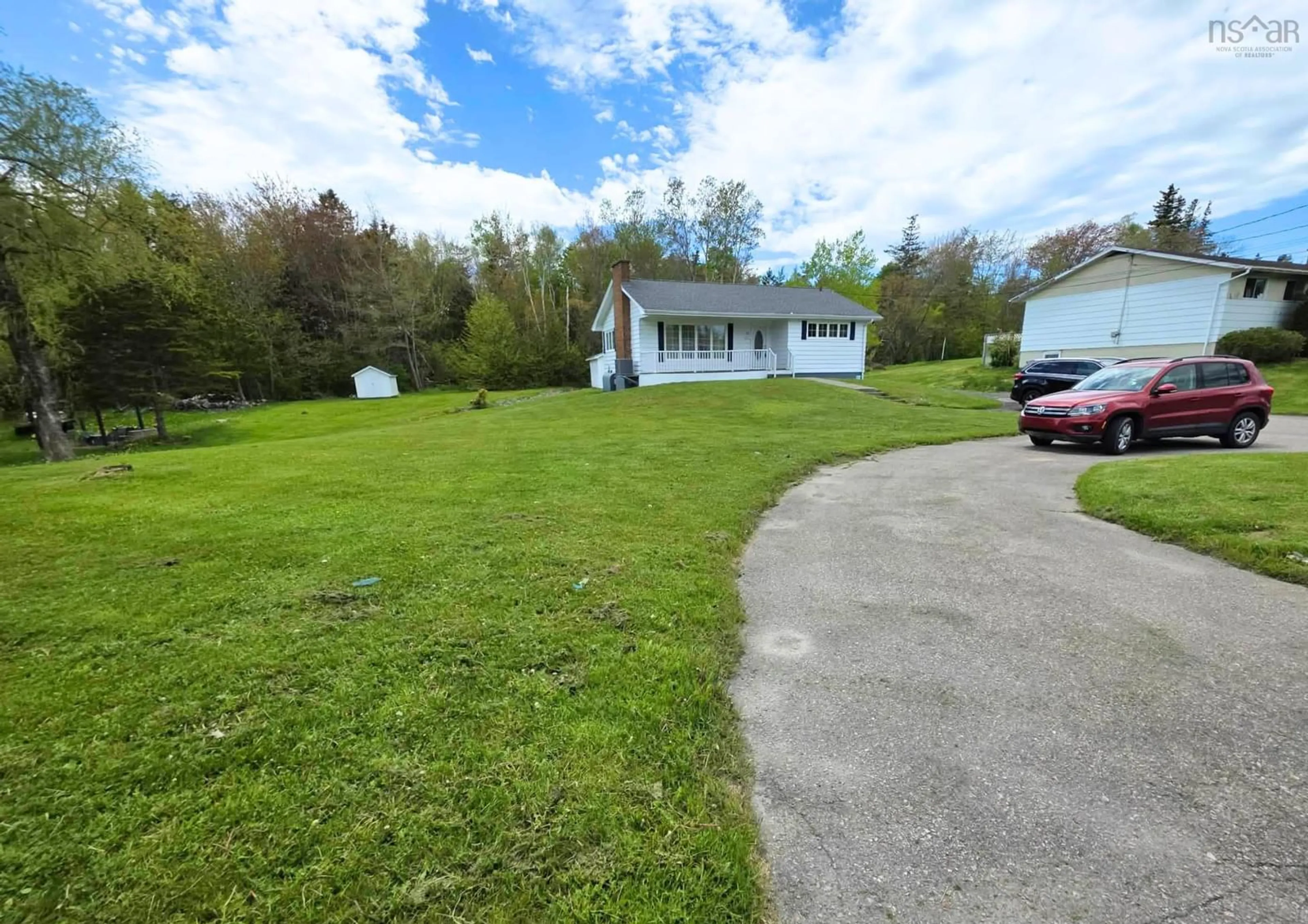 A pic from outside/outdoor area/front of a property/back of a property/a pic from drone, unknown for 61 Braemar Dr, Westmount Nova Scotia B1R 1W1