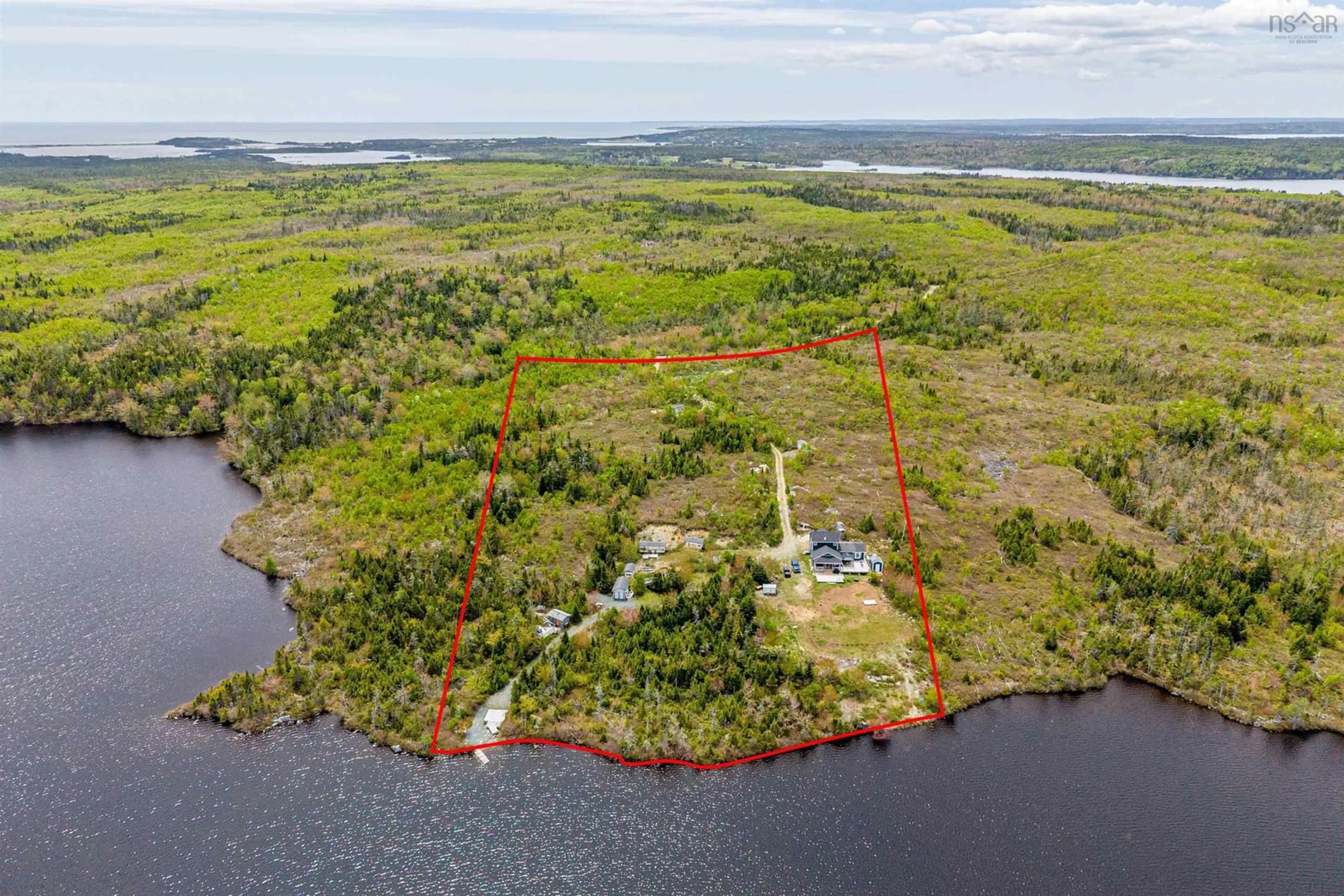 A pic from outside/outdoor area/front of a property/back of a property/a pic from drone, water/lake/river/ocean view for 600 Goose Lake Road, Mineville Nova Scotia B2Z 1K5