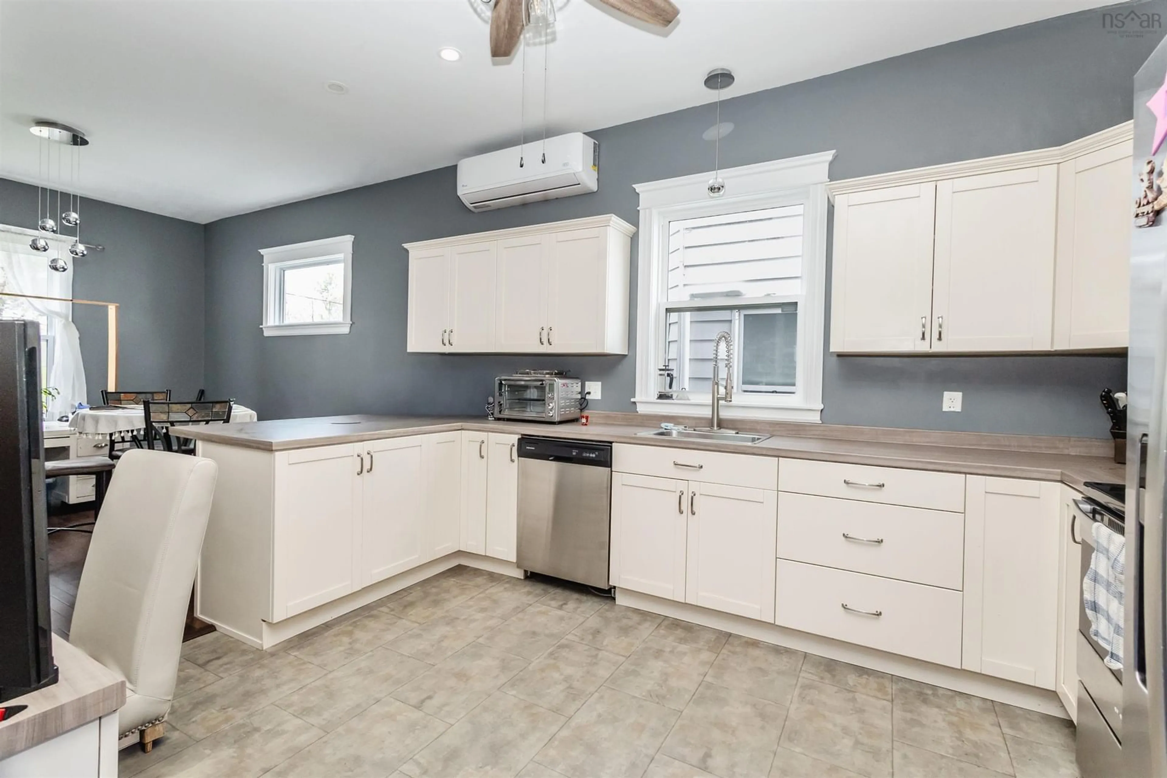 Open concept kitchen, ceramic/tile floor for 49 George St, Sydney Nova Scotia B1P 1H5