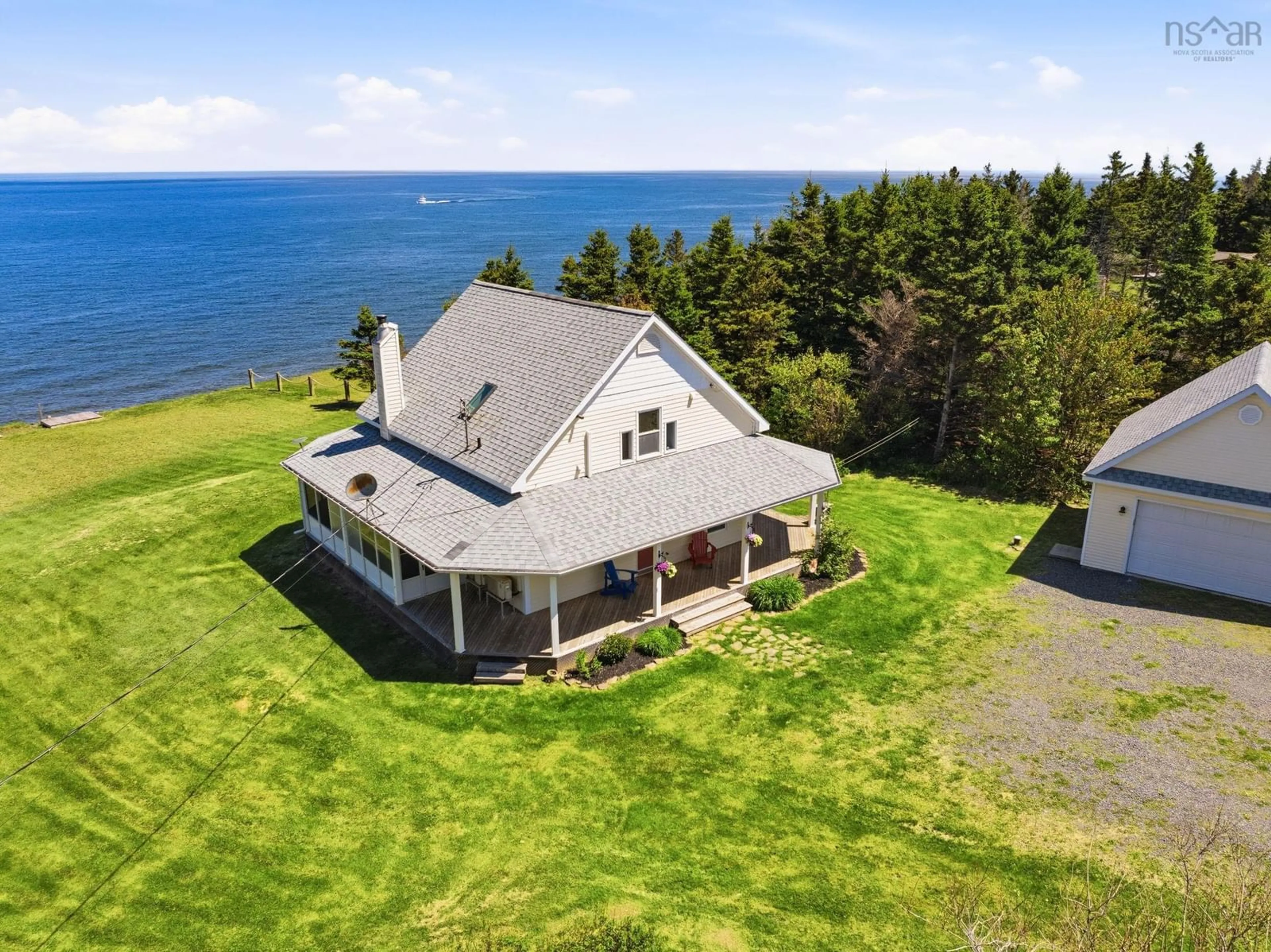 A pic from outside/outdoor area/front of a property/back of a property/a pic from drone, water/lake/river/ocean view for 889 Blue Sea Rd, Malagash Point Nova Scotia B0K 1E0
