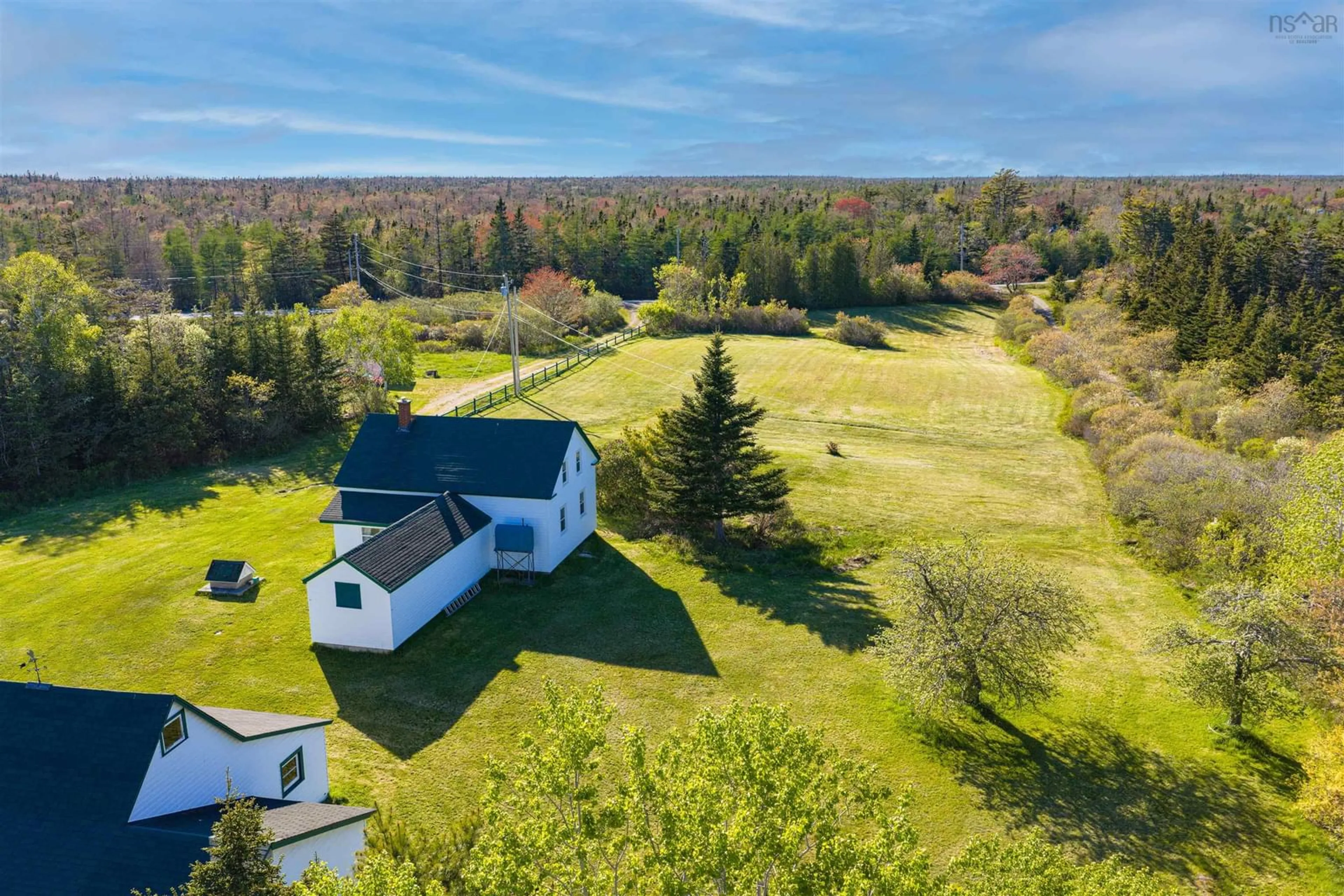 A pic from outside/outdoor area/front of a property/back of a property/a pic from drone, water/lake/river/ocean view for 4873 Shore Rd, North East Harbour Nova Scotia B0T 1W0