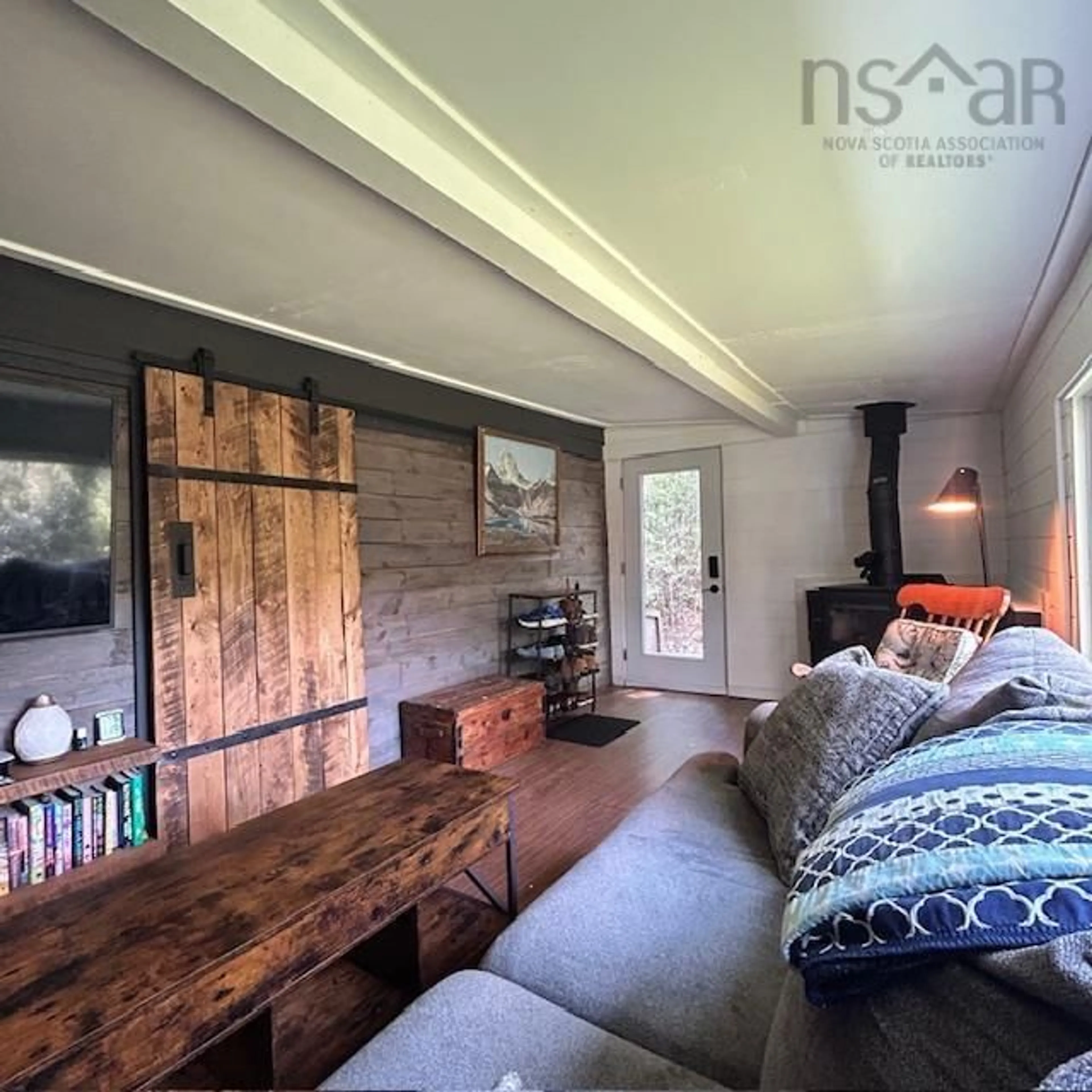 Living room with furniture, wood/laminate floor for 61 Horseback Hideaway, Labelle Nova Scotia B0T 1E0