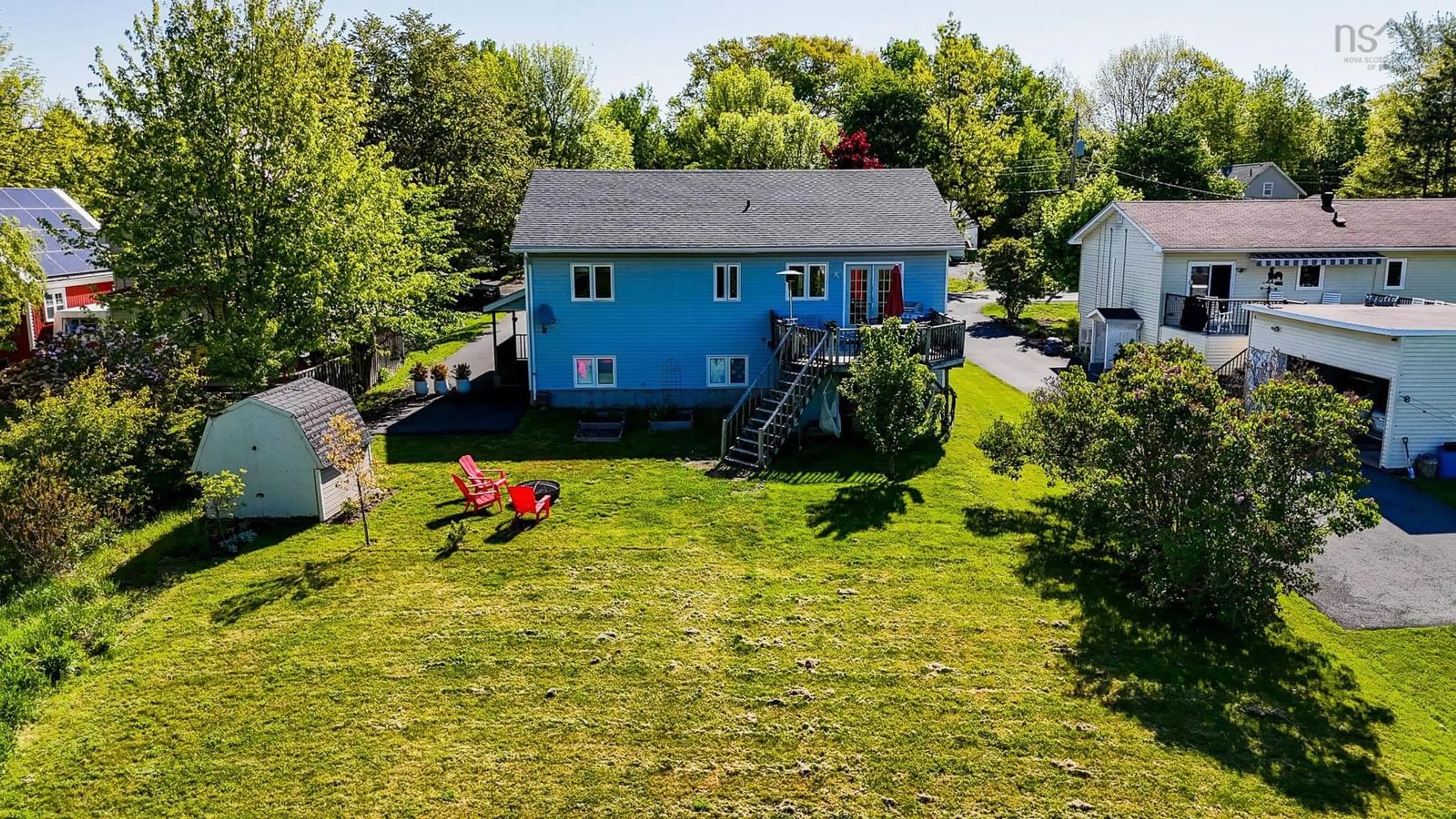 A pic from outside/outdoor area/front of a property/back of a property/a pic from drone, unknown for 8 Iona Rd, Wolfville Nova Scotia B4P 2H1