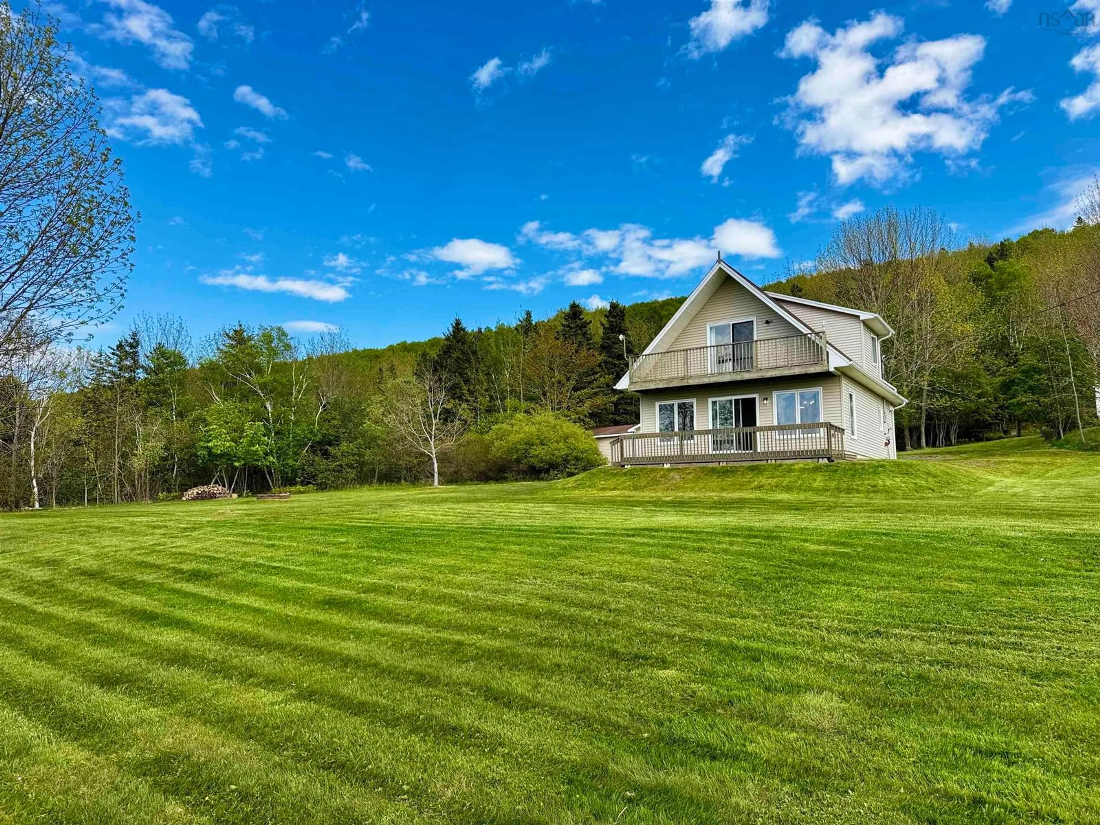 A pic from outside/outdoor area/front of a property/back of a property/a pic from drone, water/lake/river/ocean view for 3200 West Bay Rd., St George's Channel Nova Scotia B0E 3K0