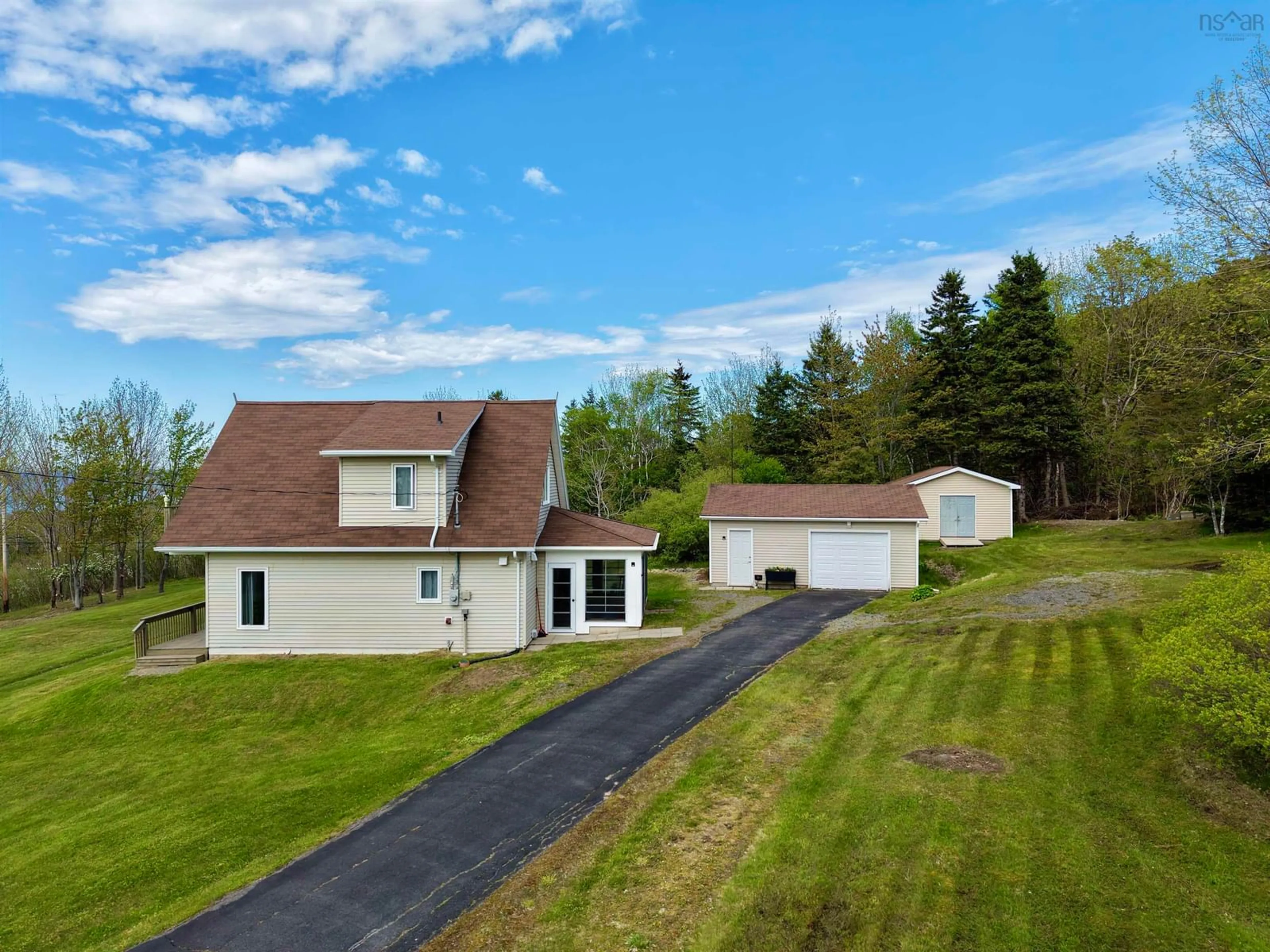 A pic from outside/outdoor area/front of a property/back of a property/a pic from drone, unknown for 3200 West Bay Rd., St George's Channel Nova Scotia B0E 3K0