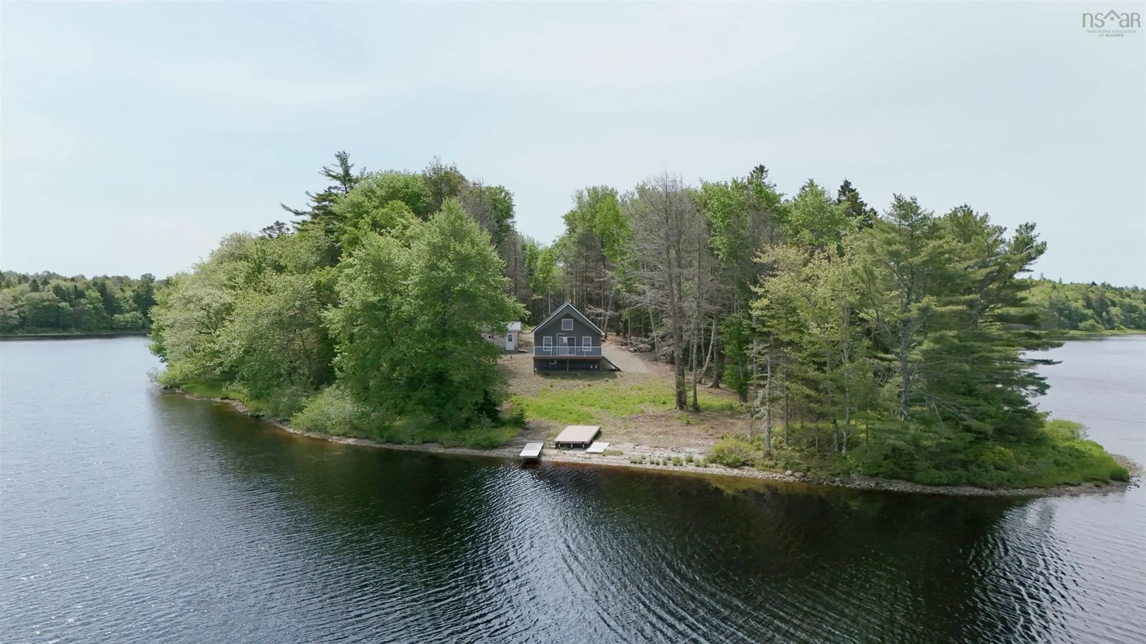 A pic from outside/outdoor area/front of a property/back of a property/a pic from drone, water/lake/river/ocean view for 402 Melanson Rd, Corberrie Nova Scotia B0W 1M0