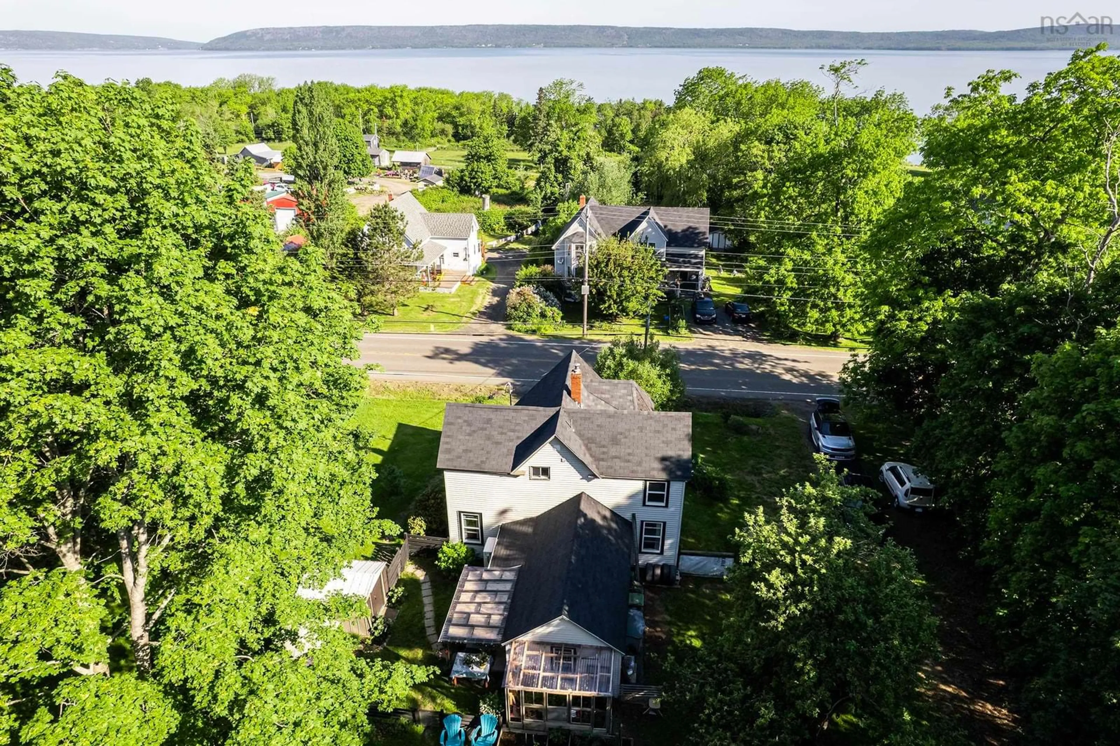 A pic from outside/outdoor area/front of a property/back of a property/a pic from drone, water/lake/river/ocean view for 564 Highway 1, Deep Brook Nova Scotia B0S 1J0