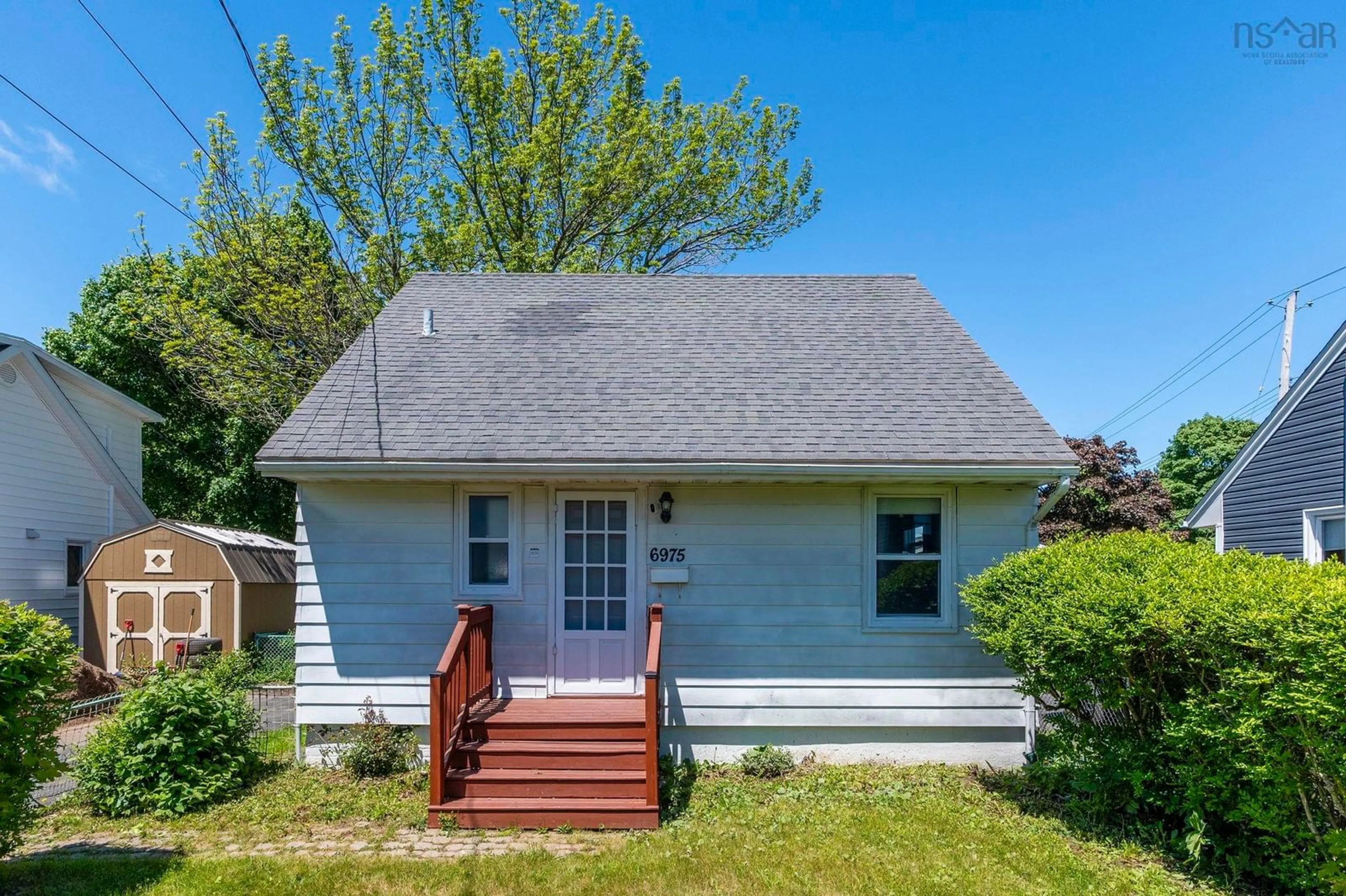 Home with vinyl exterior material, street for 6975 Ward Avenue Ave, Halifax Nova Scotia B3L 2K6
