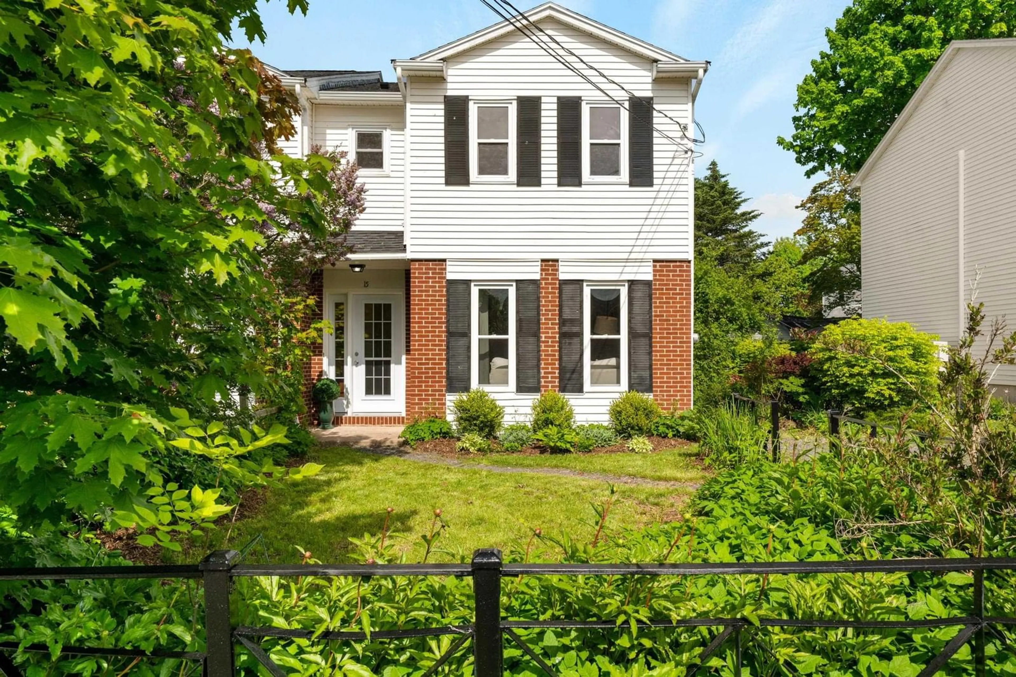 Home with brick exterior material, street for 15 Cherry Lane, Wolfville Nova Scotia B4P 1T9