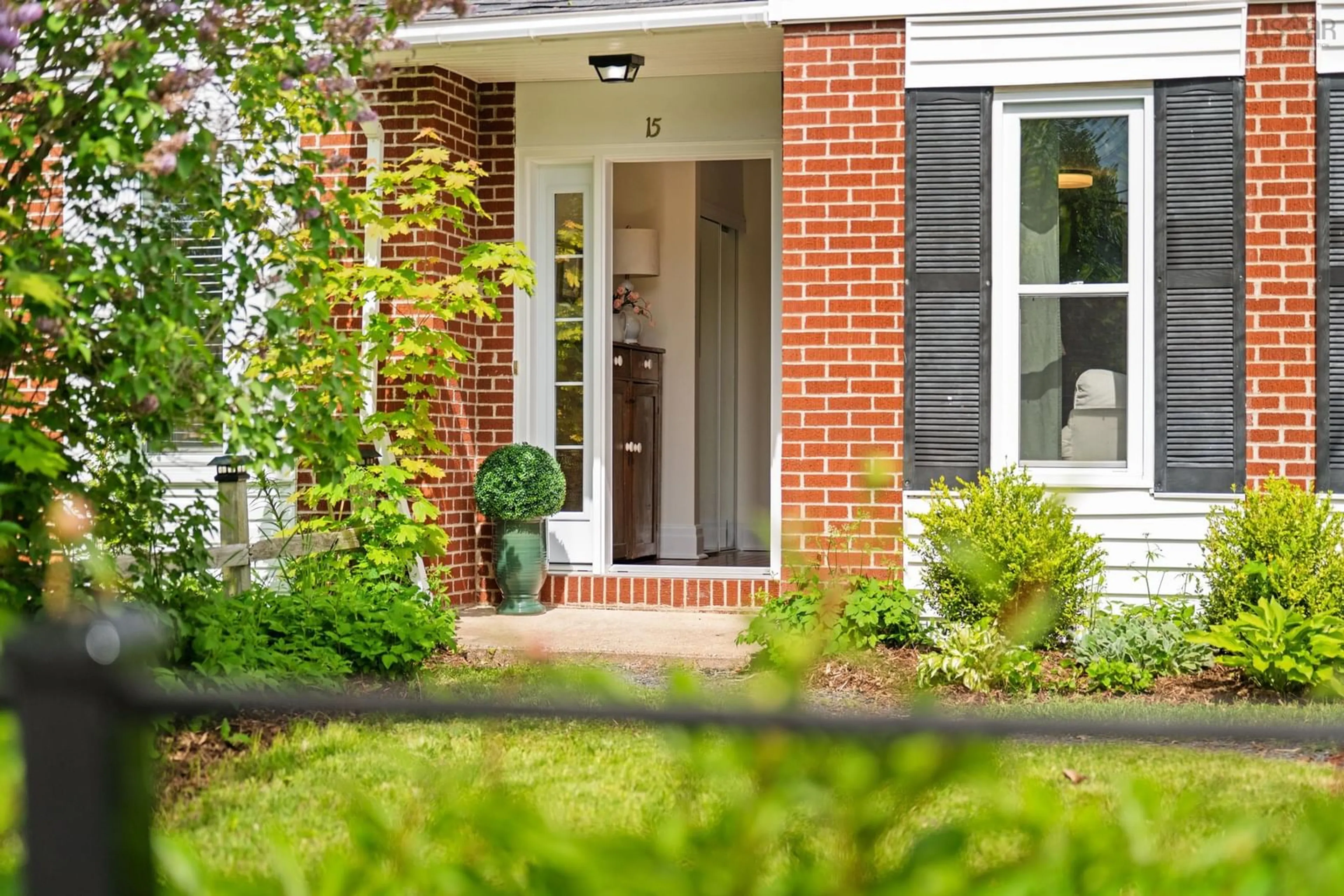 Home with brick exterior material, street for 15 Cherry Lane, Wolfville Nova Scotia B4P 1T9