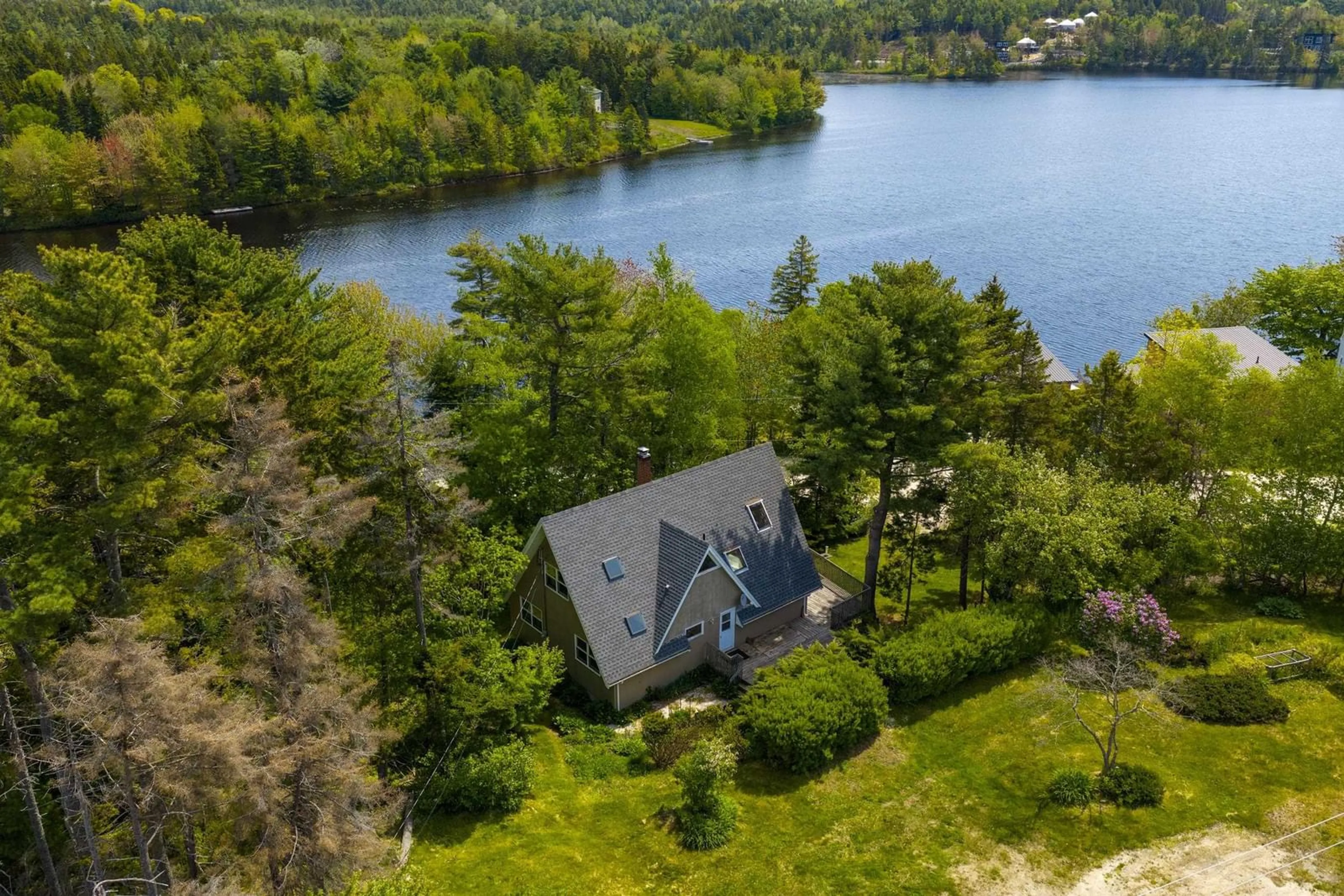 A pic from outside/outdoor area/front of a property/back of a property/a pic from drone, water/lake/river/ocean view for 4154 Highway 3, Chester Nova Scotia B0J 1J0