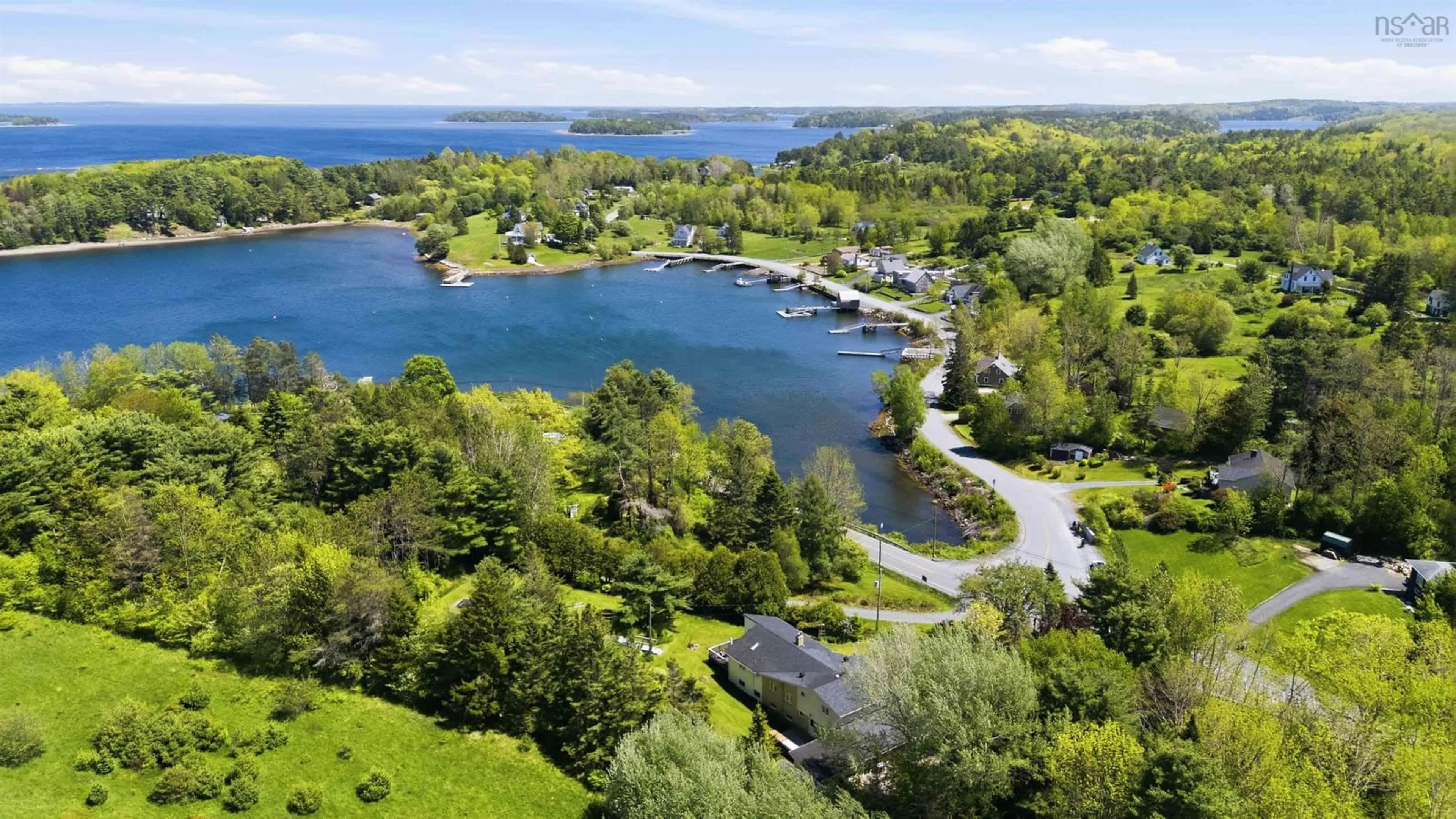 A pic from outside/outdoor area/front of a property/back of a property/a pic from drone, water/lake/river/ocean view for 9380 Highway 3, Maders Cove Nova Scotia B0J 2E0