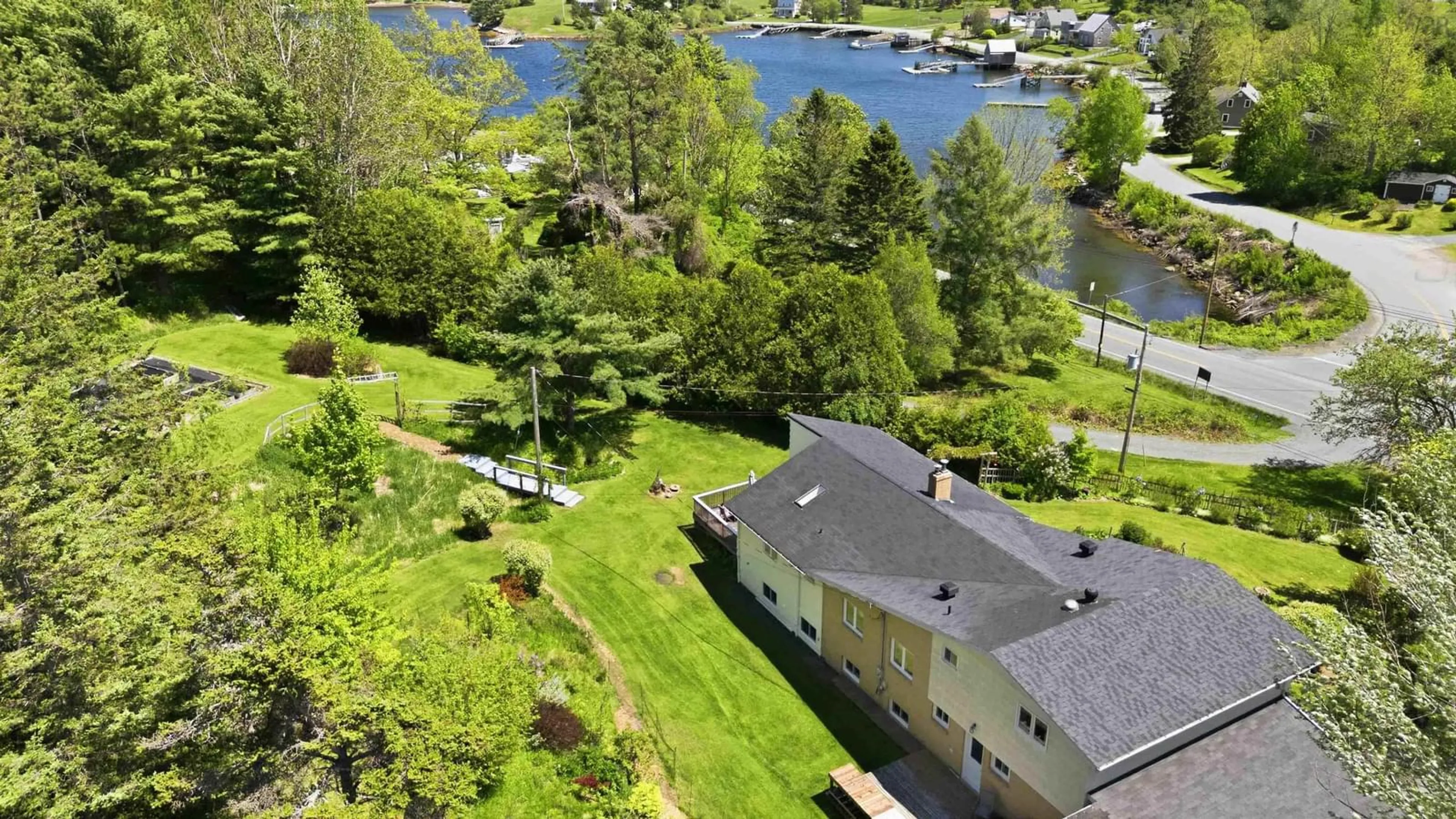 A pic from outside/outdoor area/front of a property/back of a property/a pic from drone, water/lake/river/ocean view for 9380 Highway 3, Maders Cove Nova Scotia B0J 2E0