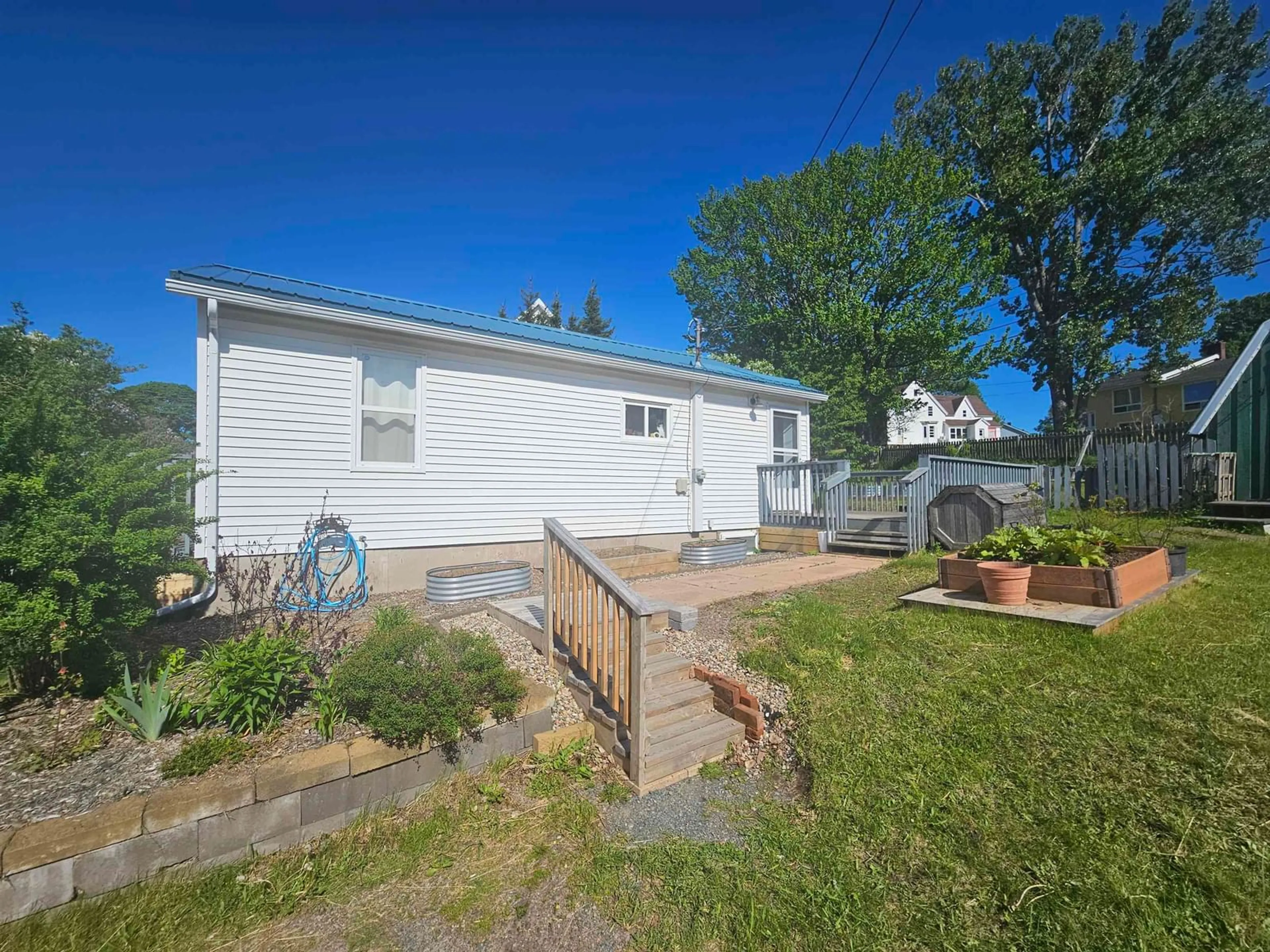 A pic from outside/outdoor area/front of a property/back of a property/a pic from drone, unknown for 3 Beacon St, Amherst Nova Scotia B4H 1P1