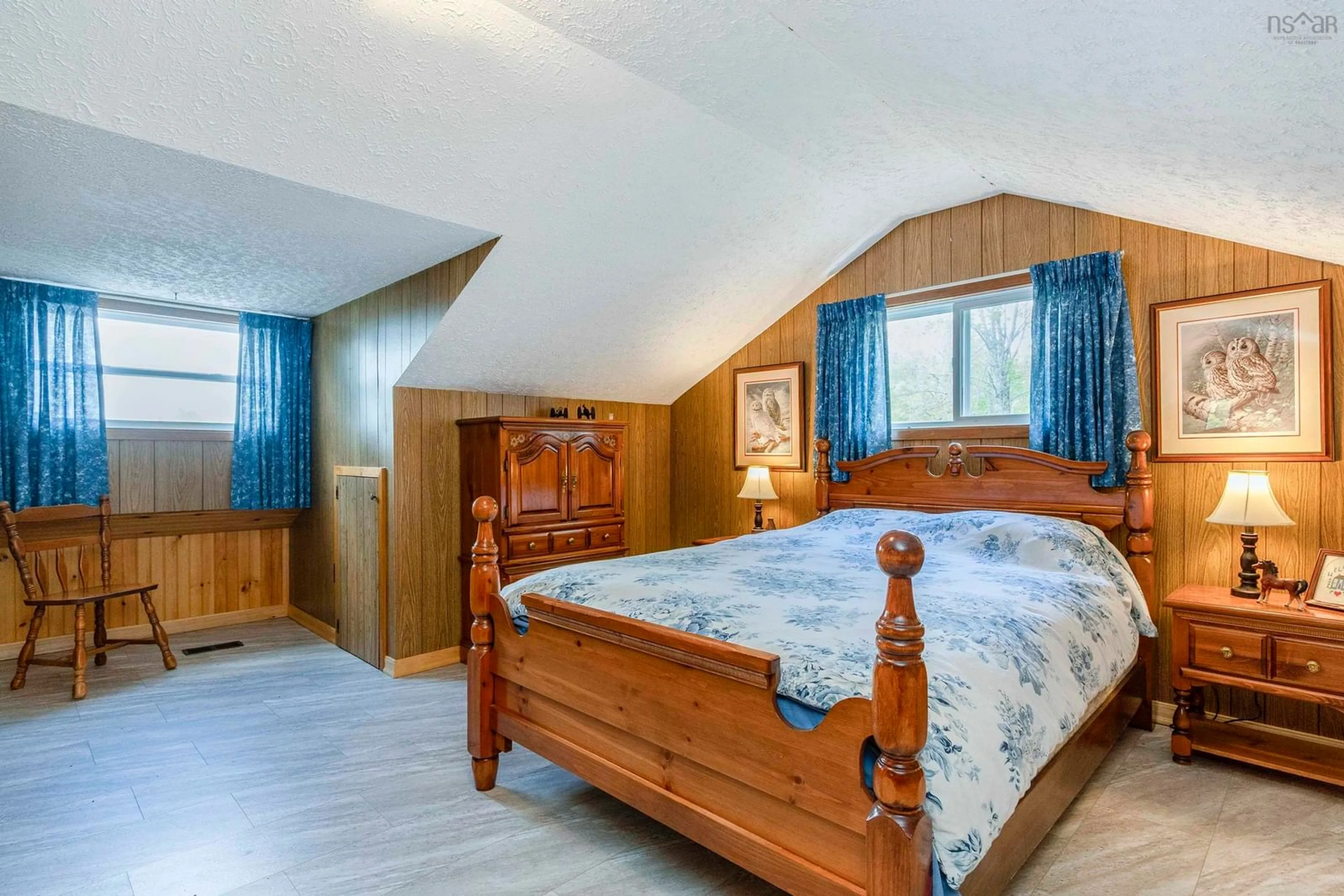 Bedroom with bed, wood/laminate floor for 4784 Aylesford Rd, Lake George Nova Scotia B0P 1C0