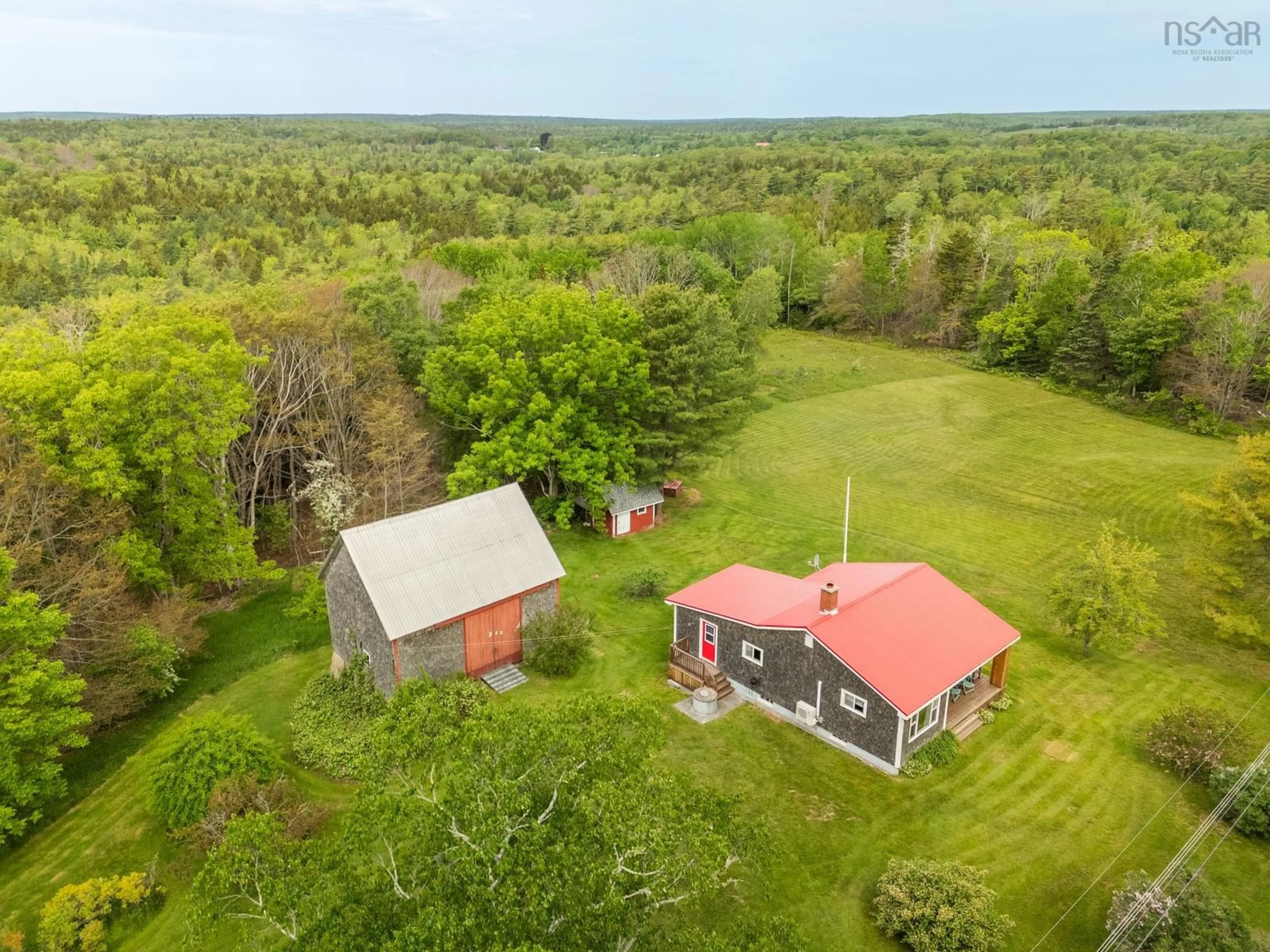 A pic from outside/outdoor area/front of a property/back of a property/a pic from drone, forest/trees view for 112 Kelly Rd, Carleton Nova Scotia B5A 5R2