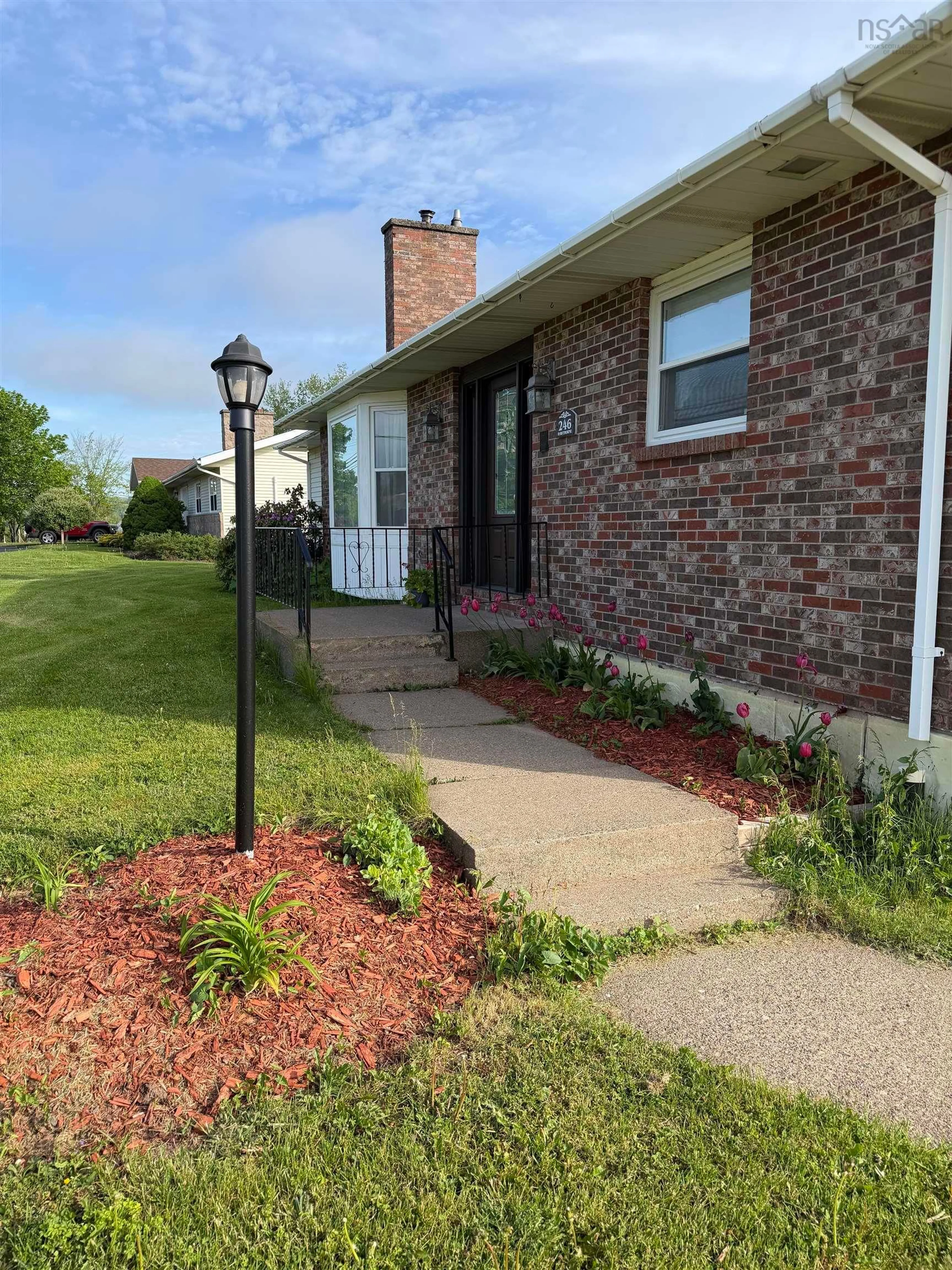 Home with brick exterior material, street for 246 Hawthorne Street B2g 2r3, Antigonish Nova Scotia B2G 2R3