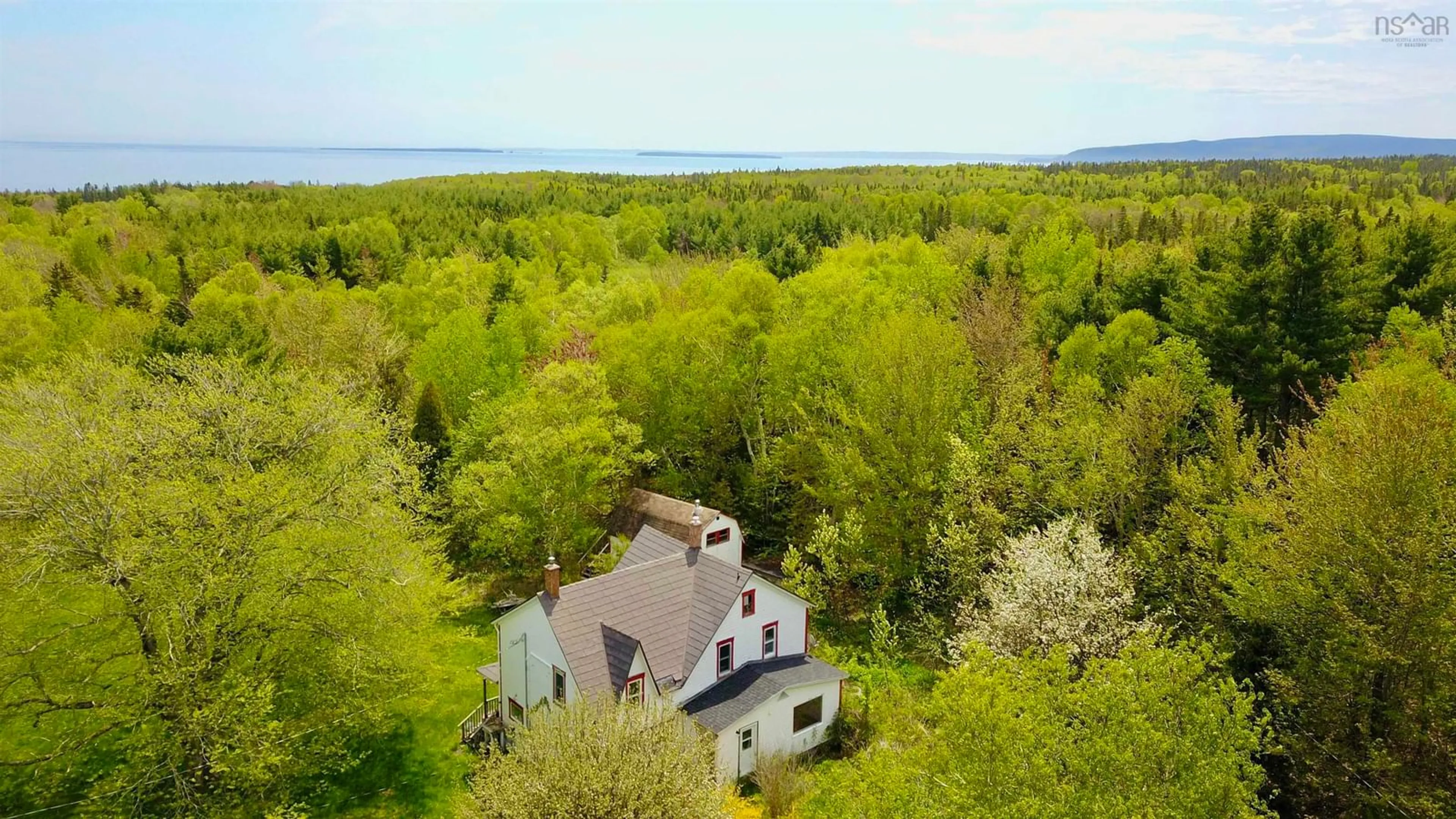 A pic from outside/outdoor area/front of a property/back of a property/a pic from drone, water/lake/river/ocean view for 44429 Cabot Trail, Little River Nova Scotia B0C 1H0