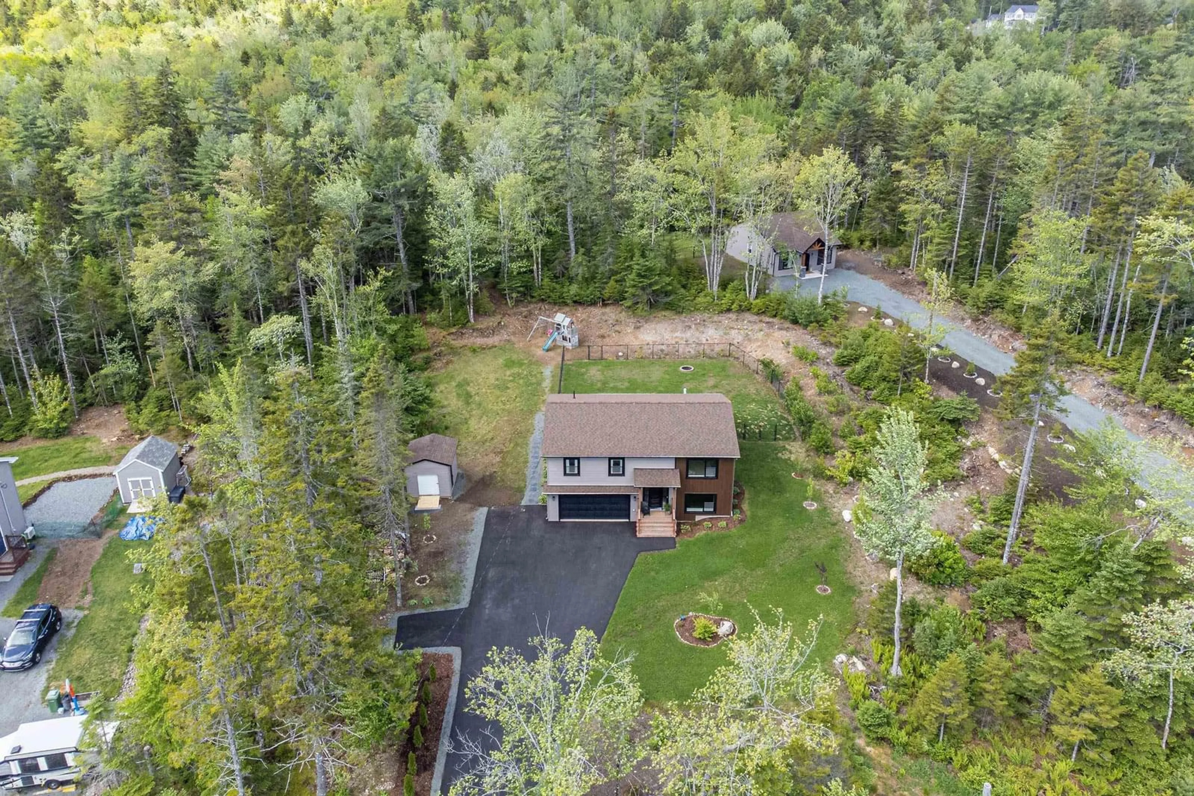 A pic from outside/outdoor area/front of a property/back of a property/a pic from drone, forest/trees view for 107/109 Bearpaw Dr, Beaver Bank Nova Scotia B4G 0C3
