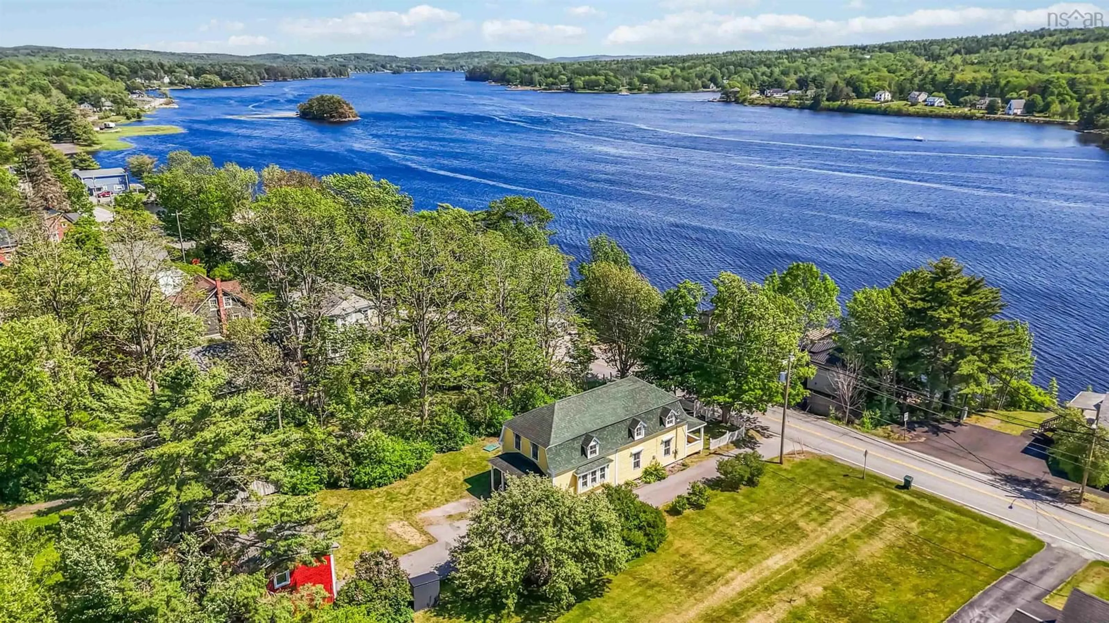 A pic from outside/outdoor area/front of a property/back of a property/a pic from drone, water/lake/river/ocean view for 13594 Highway 3, Dayspring Nova Scotia B4V 5P1