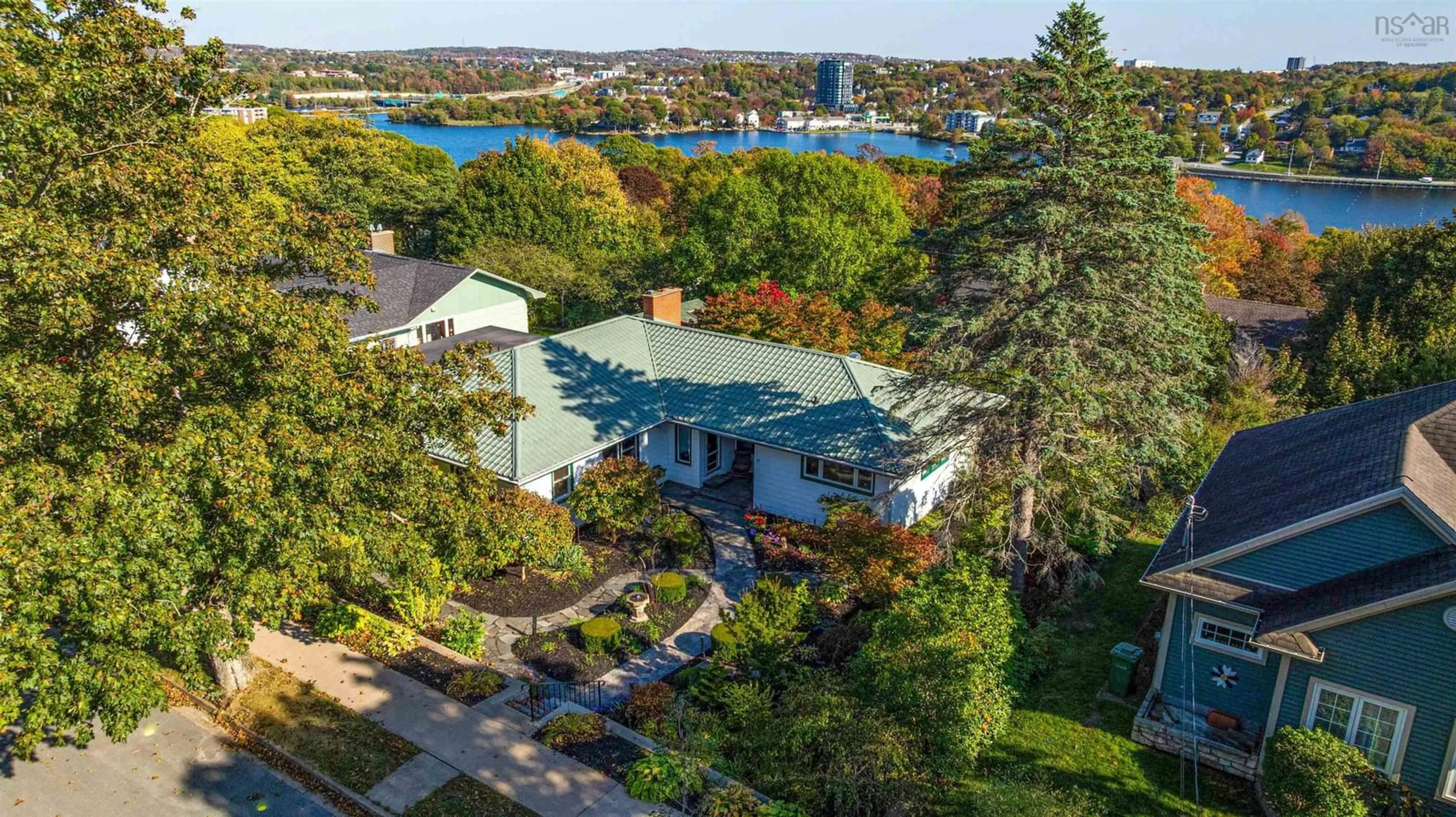 A pic from outside/outdoor area/front of a property/back of a property/a pic from drone, water/lake/river/ocean view for 15 Lakeview Ave, Dartmouth Nova Scotia B3A 3S8