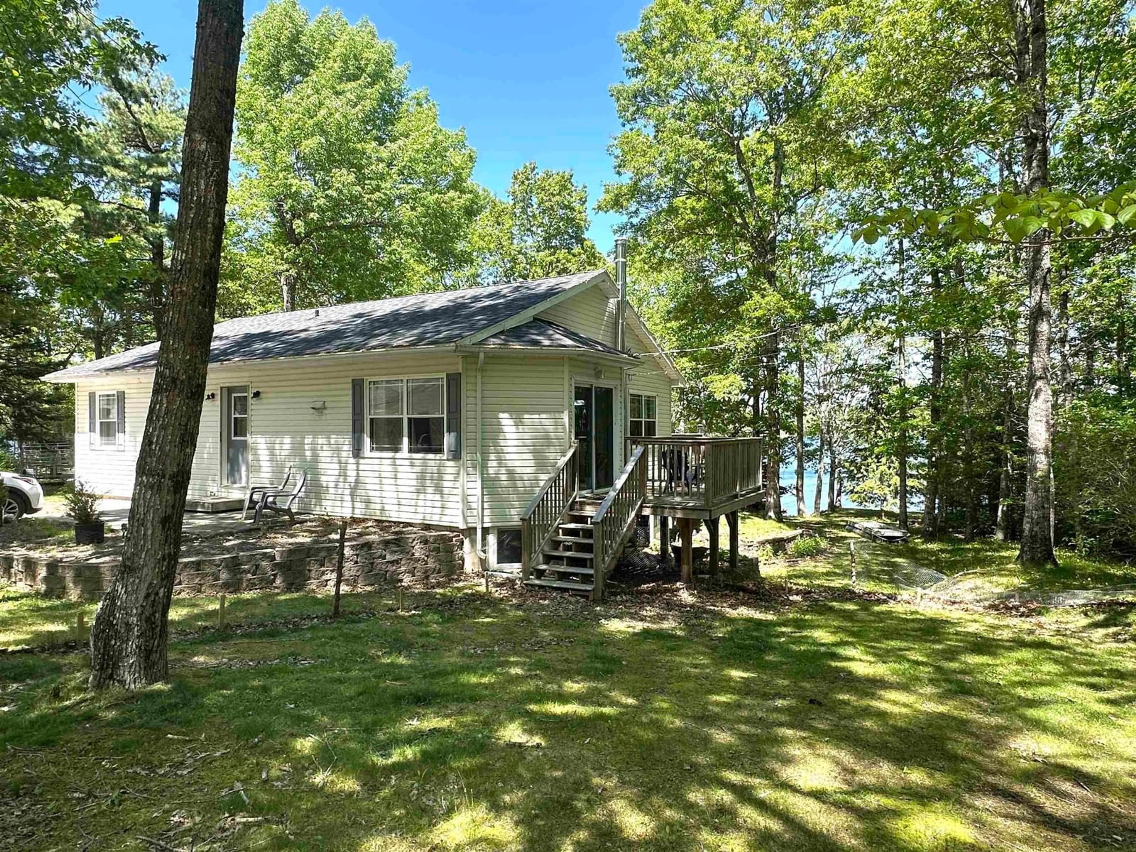 A pic from outside/outdoor area/front of a property/back of a property/a pic from drone, water/lake/river/ocean view for 44 Molega Lake Park Rd, Molega Lake Nova Scotia B4V 8T2