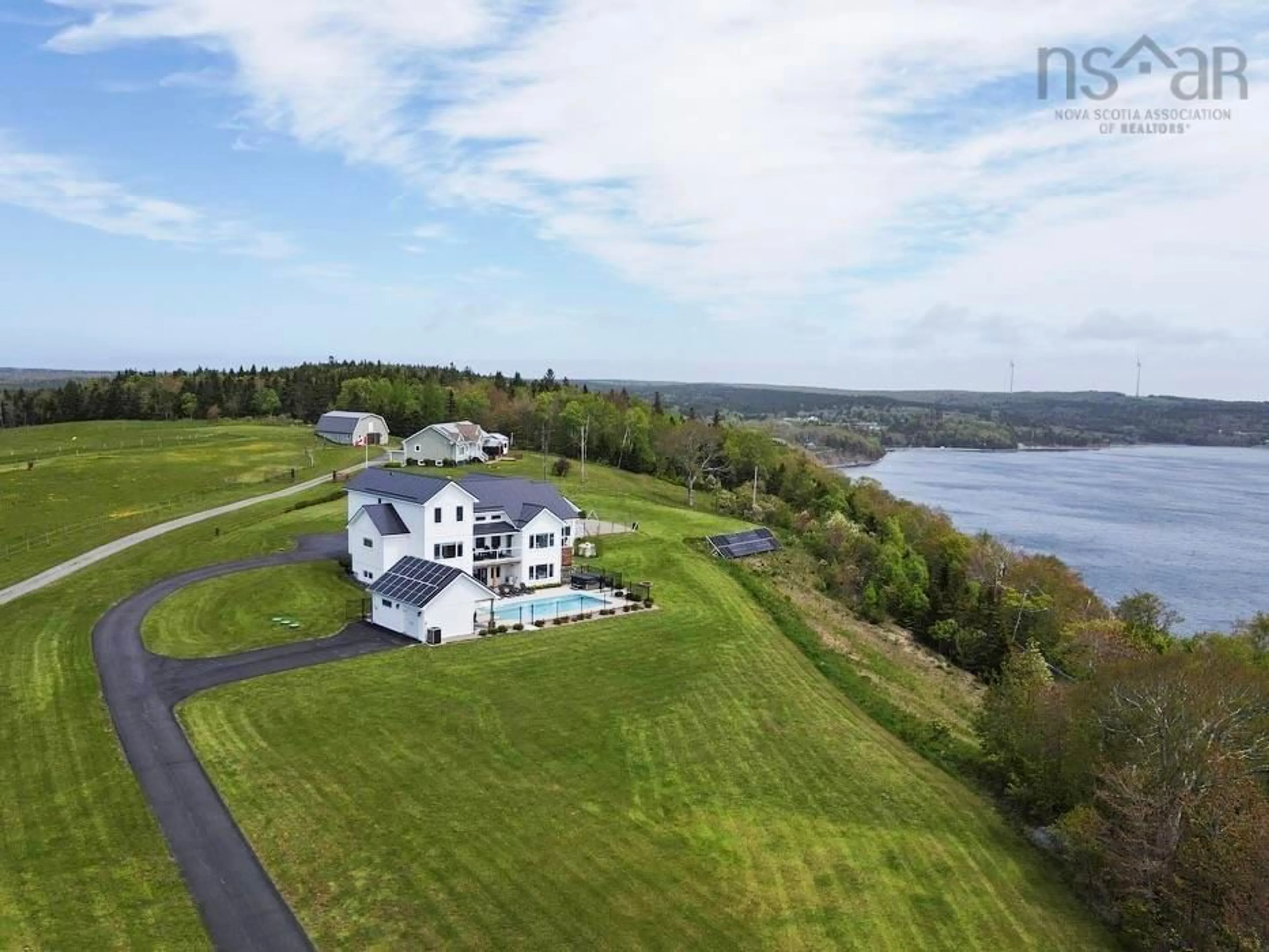 A pic from outside/outdoor area/front of a property/back of a property/a pic from drone, water/lake/river/ocean view for 2000 Hillside Boularderie Rd, Hillside Boularderie Nova Scotia B1Y 2T6