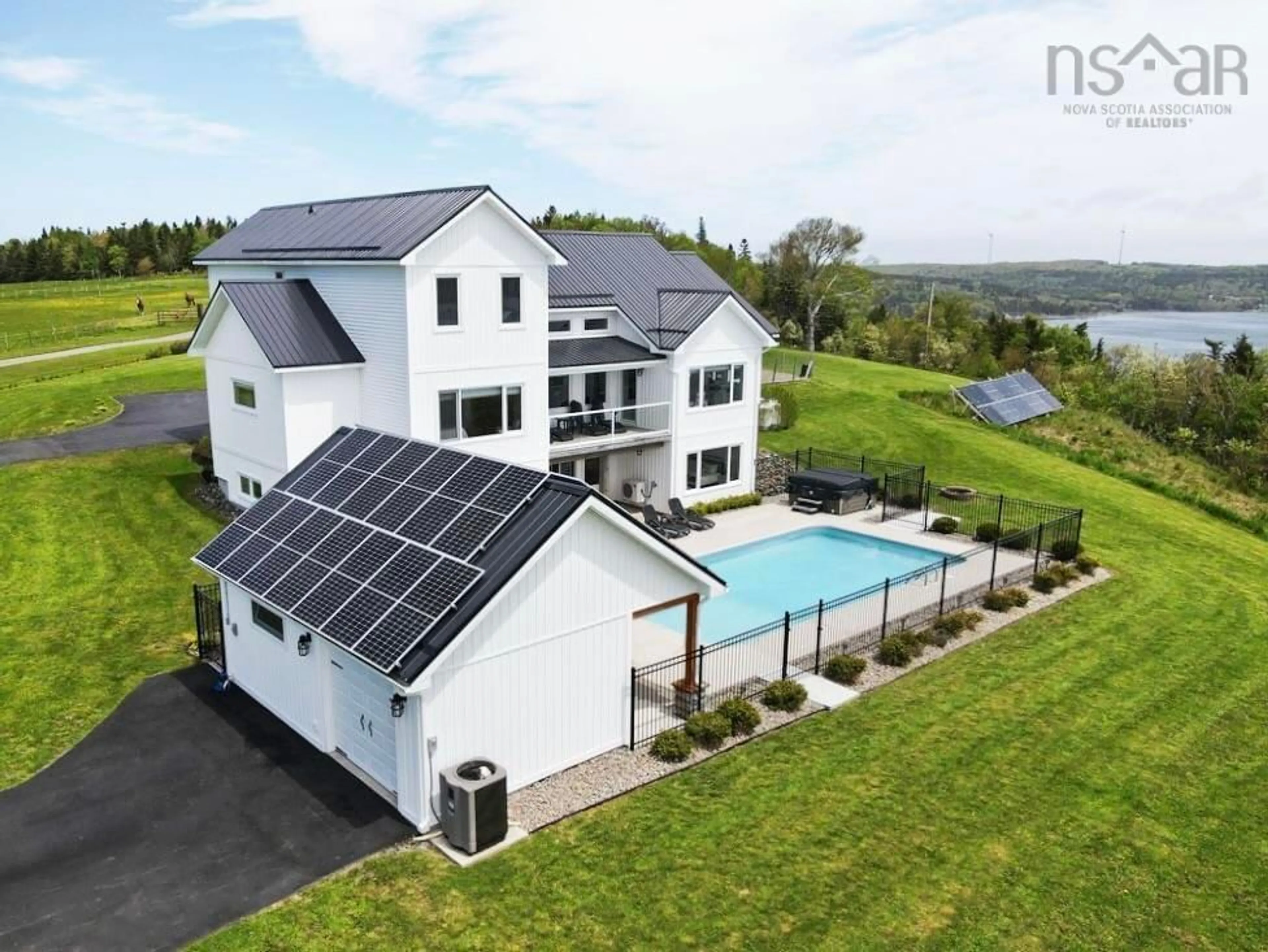 A pic from outside/outdoor area/front of a property/back of a property/a pic from drone, water/lake/river/ocean view for 2000 Hillside Boularderie Rd, Hillside Boularderie Nova Scotia B1Y 2T6