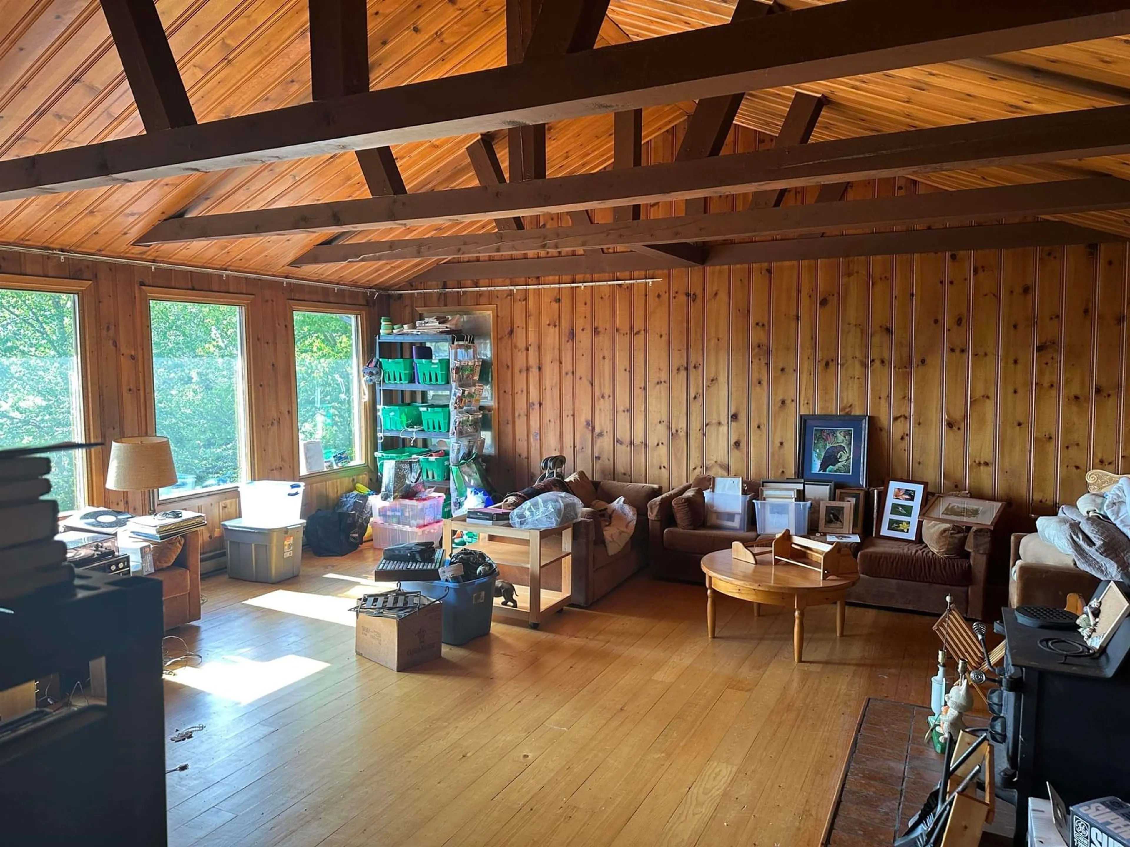 Living room with furniture, wood/laminate floor for 179 Camelot Dr, Seabright Nova Scotia B3Z 2Z7