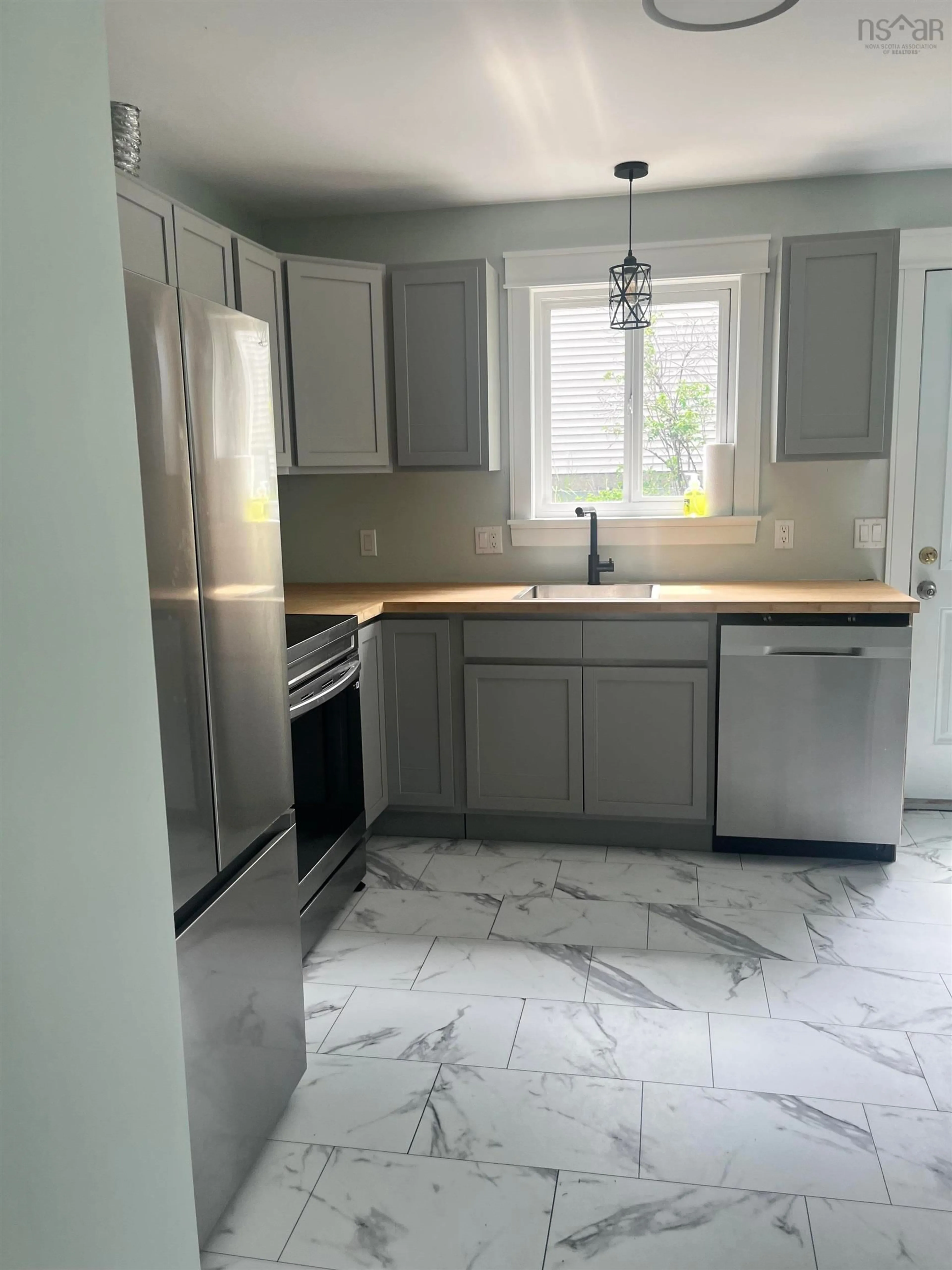 Open concept kitchen, ceramic/tile floor for Spencer Ave #2, Halifax Nova Scotia B3R 1S6