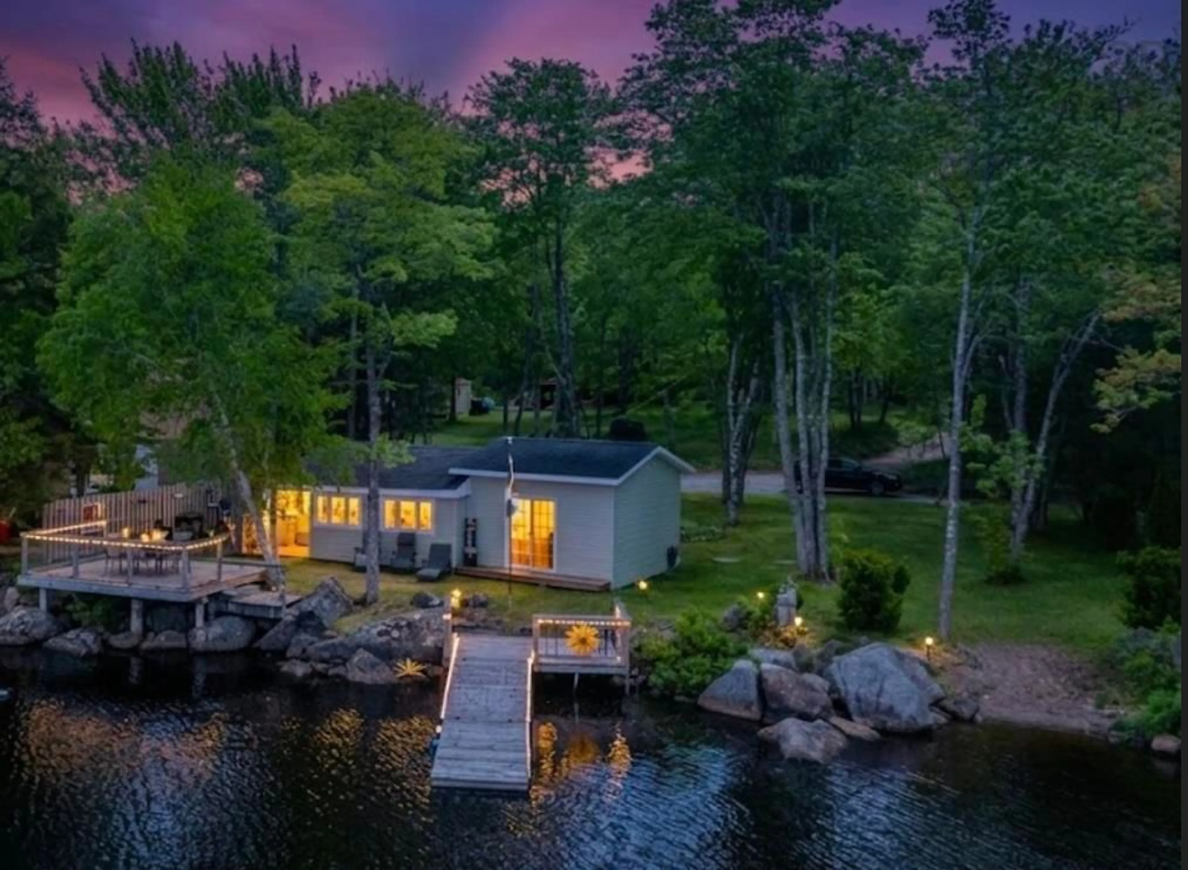 A pic from outside/outdoor area/front of a property/back of a property/a pic from drone, water/lake/river/ocean view for 41 Lake Paul Rd, Lake Paul Nova Scotia B0P 1C0