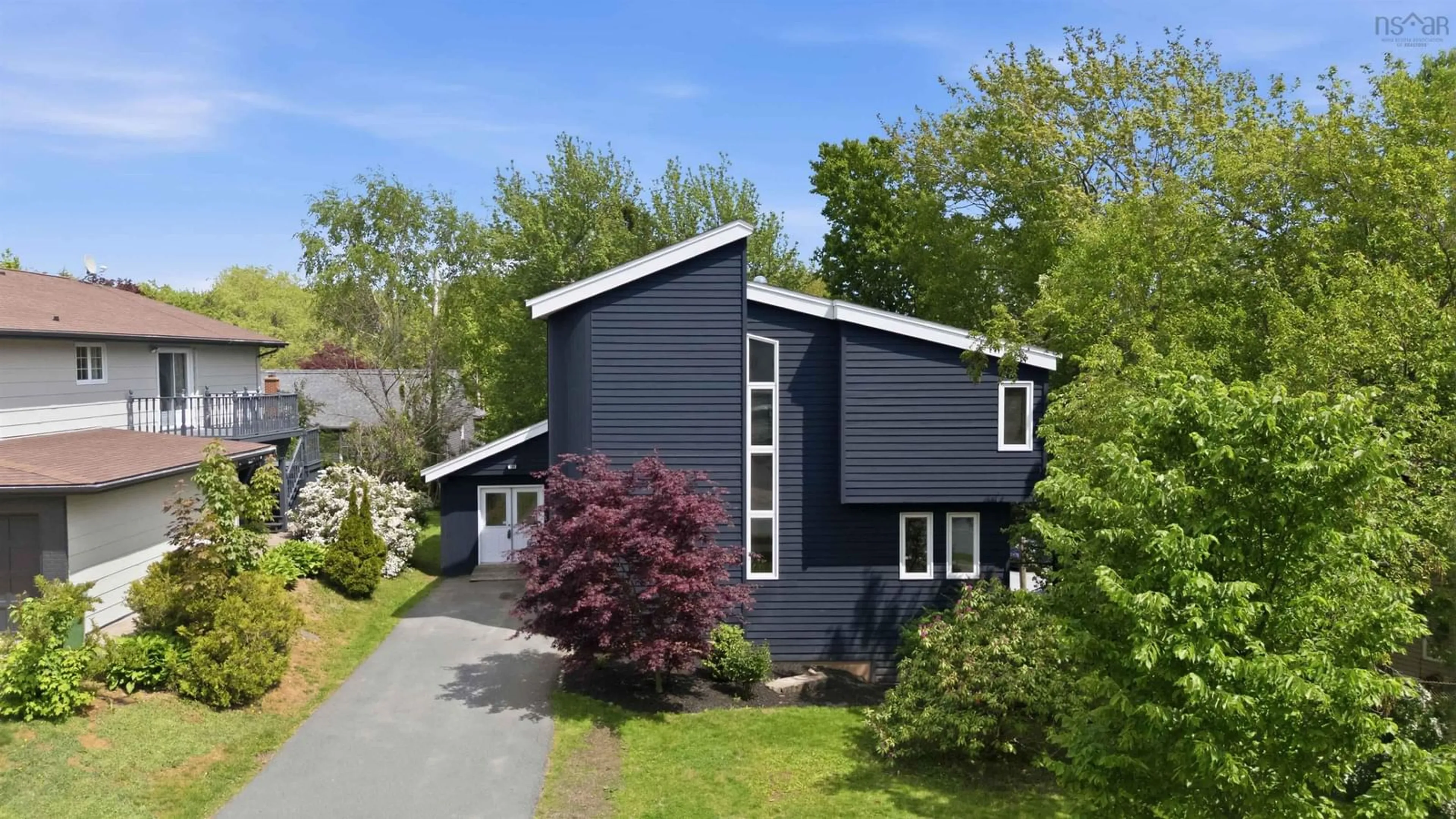 Home with vinyl exterior material, street for 100 Bayview Rd, Halifax Nova Scotia B3M 1N9