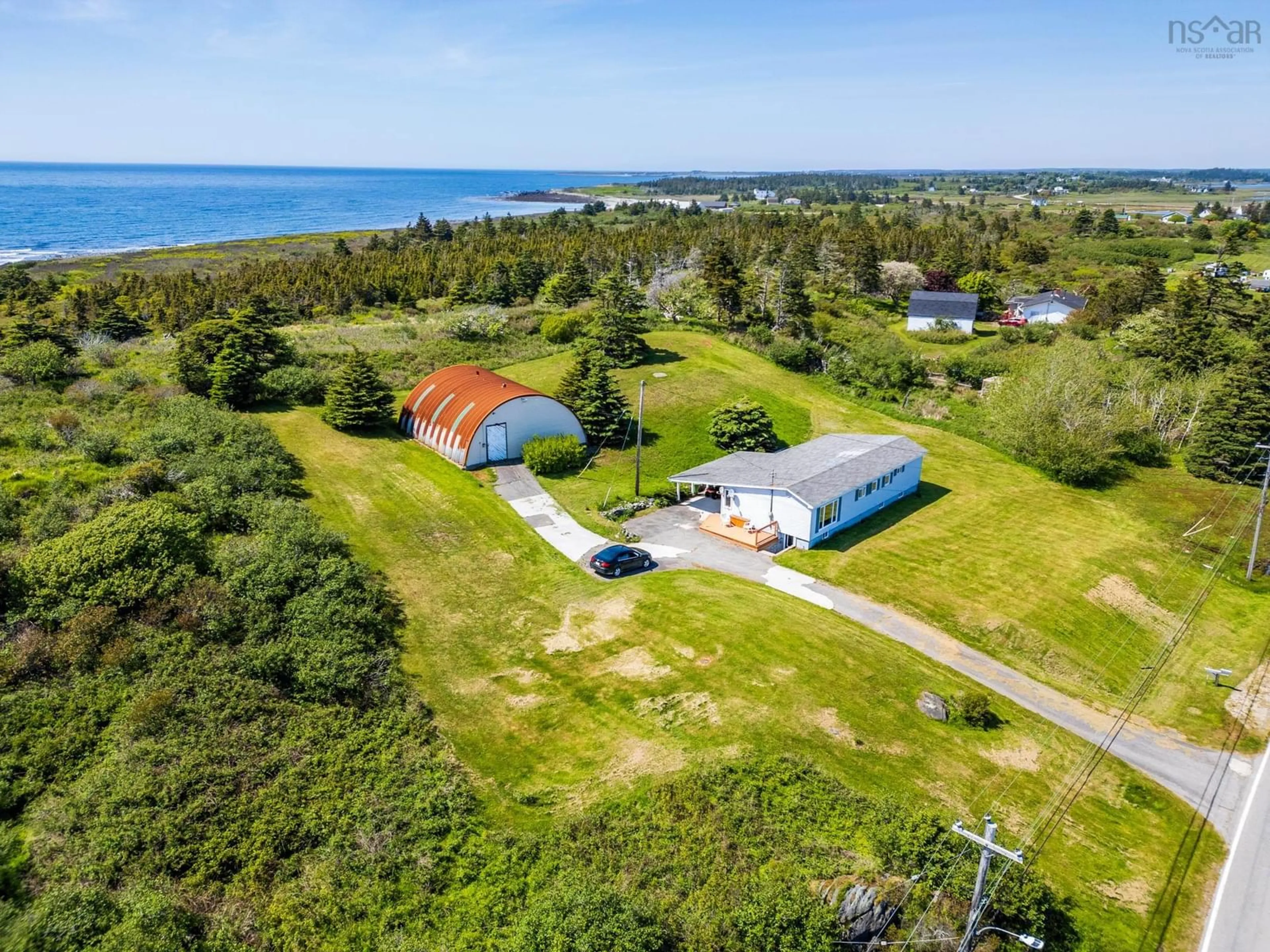 A pic from outside/outdoor area/front of a property/back of a property/a pic from drone, water/lake/river/ocean view for 980 Highway 304, Overton Nova Scotia B5A 5G7