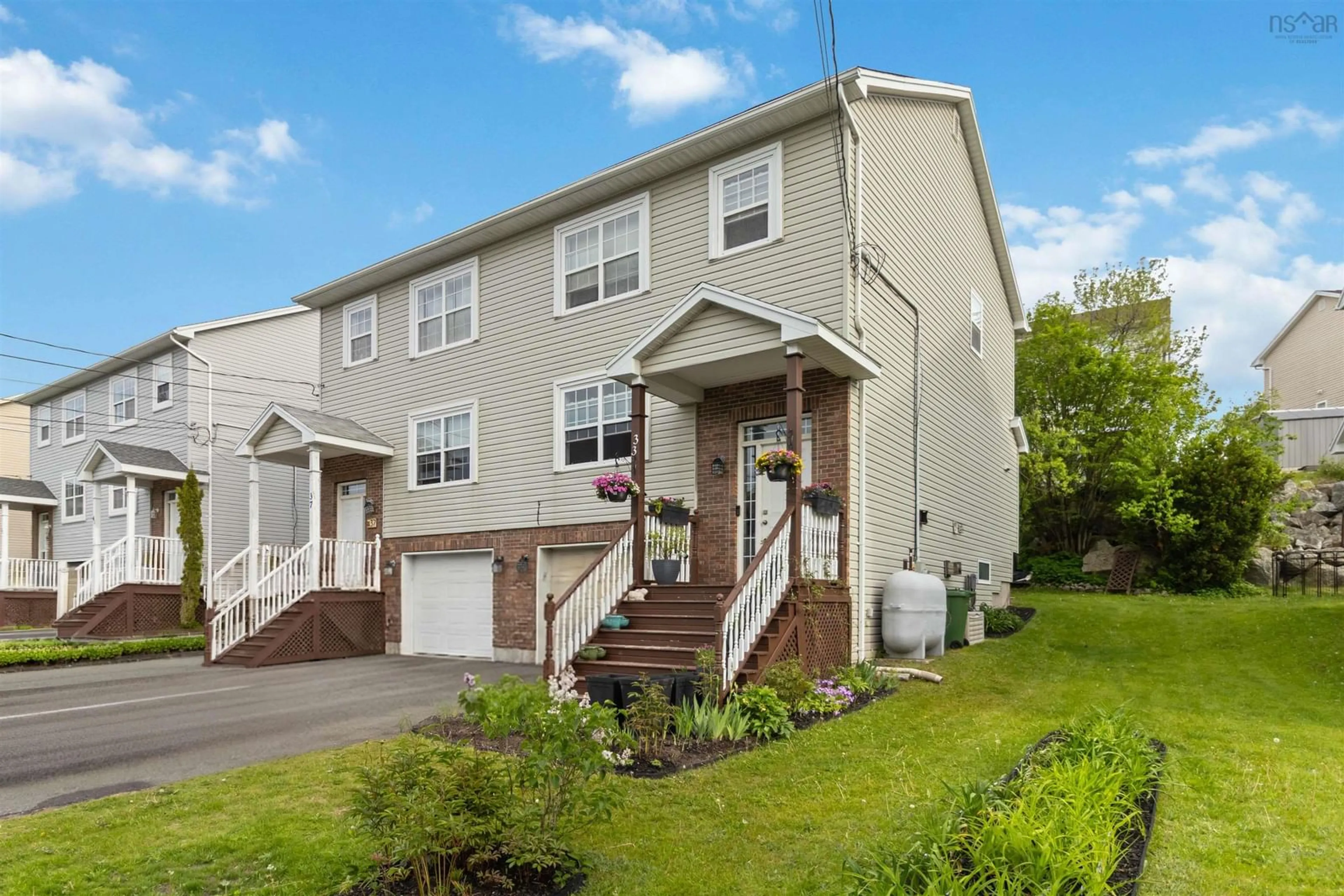 Home with vinyl exterior material, street for 33 Sheppards Run, Beechville Nova Scotia B3T 2E6