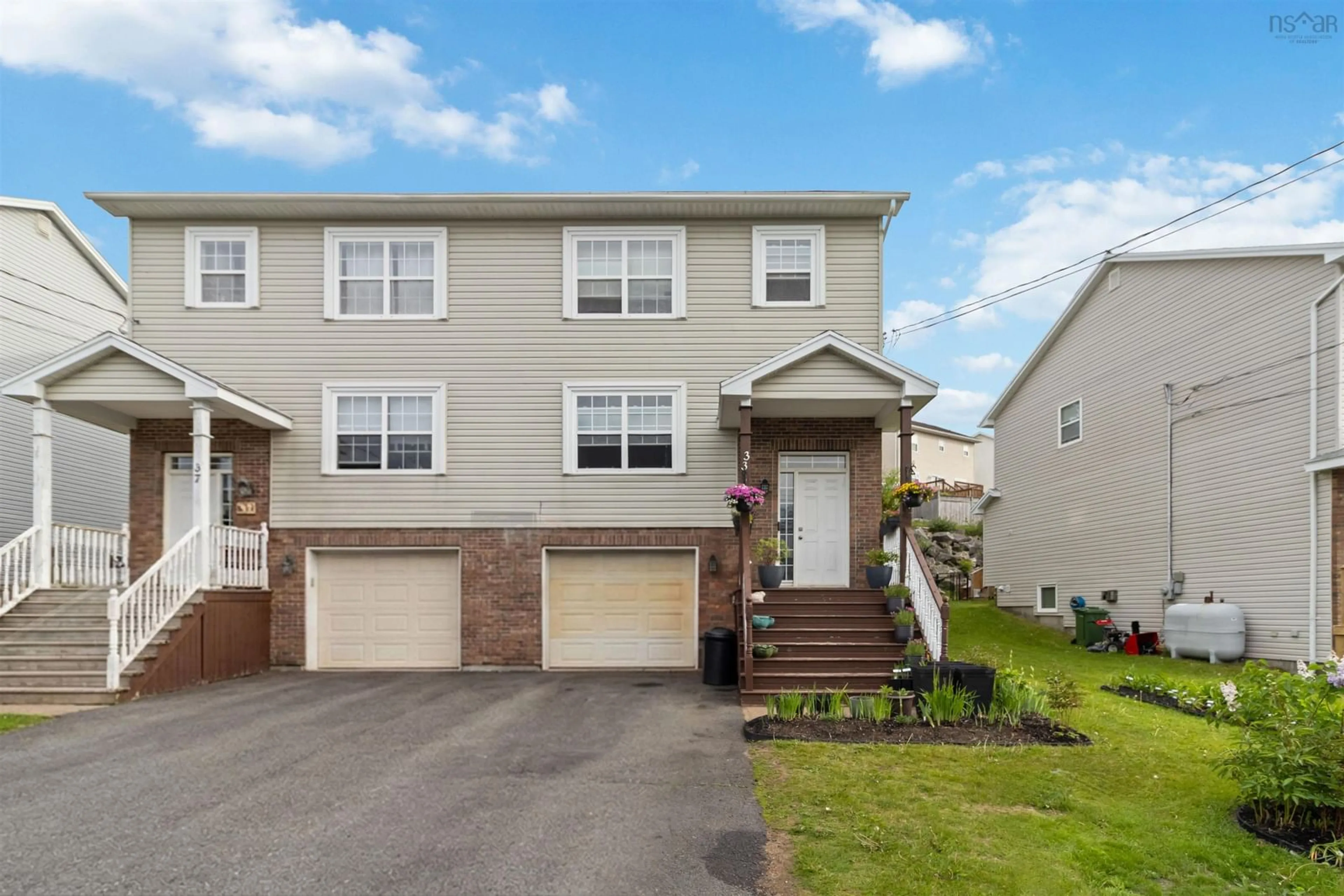 Home with vinyl exterior material, street for 33 Sheppards Run, Beechville Nova Scotia B3T 2E6
