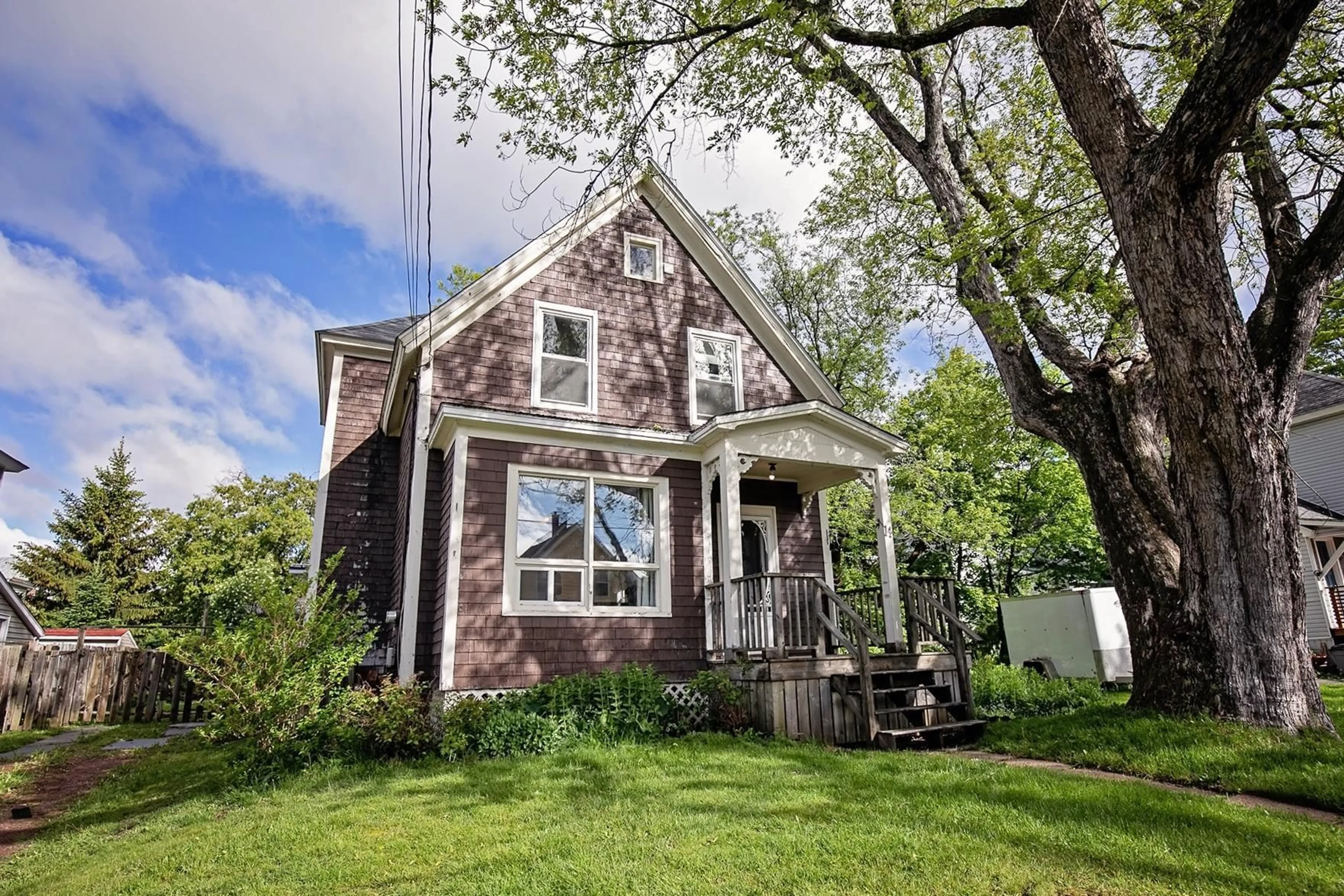 Home with vinyl exterior material, street for 14 Clifford St, Amherst Nova Scotia B4H 2E8