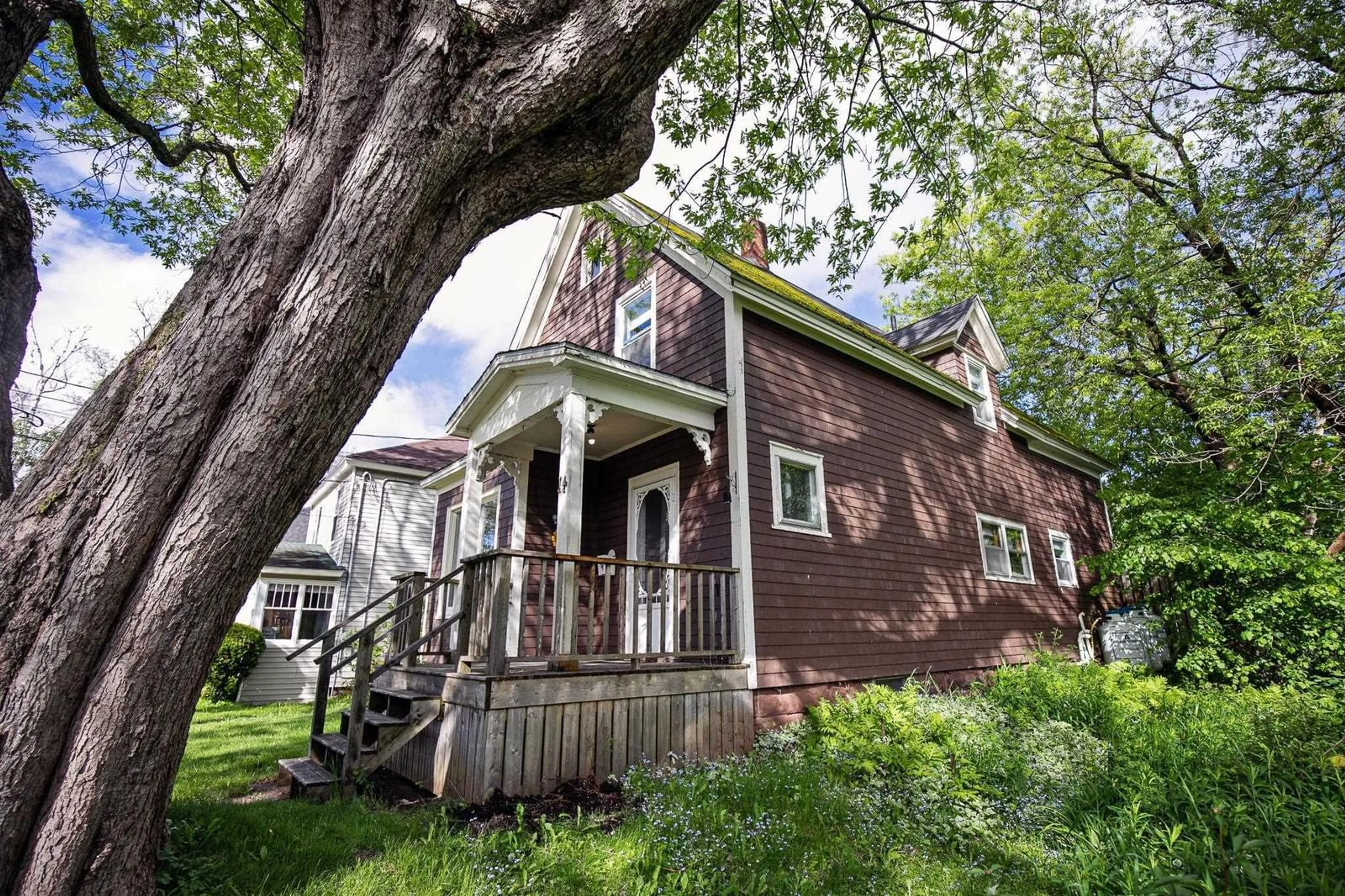 Home with vinyl exterior material, street for 14 Clifford St, Amherst Nova Scotia B4H 2E8