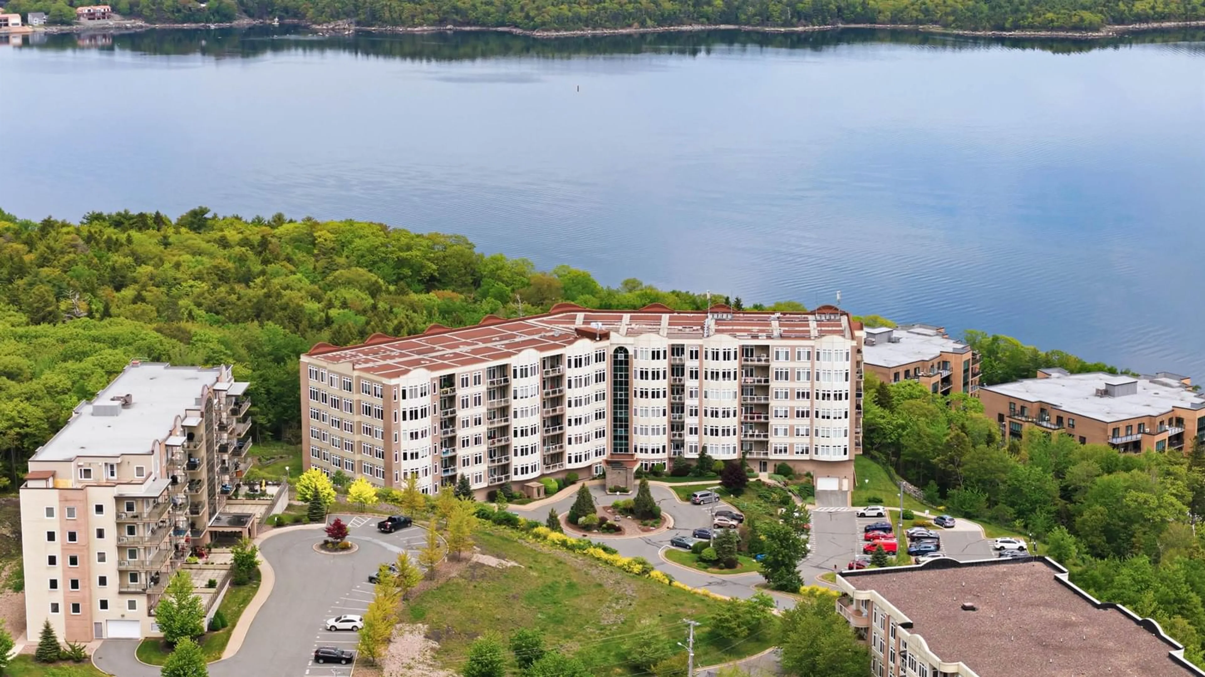 A pic from outside/outdoor area/front of a property/back of a property/a pic from drone, water/lake/river/ocean view for 94 Bedros Lane #214, Halifax Nova Scotia B3M 4X3