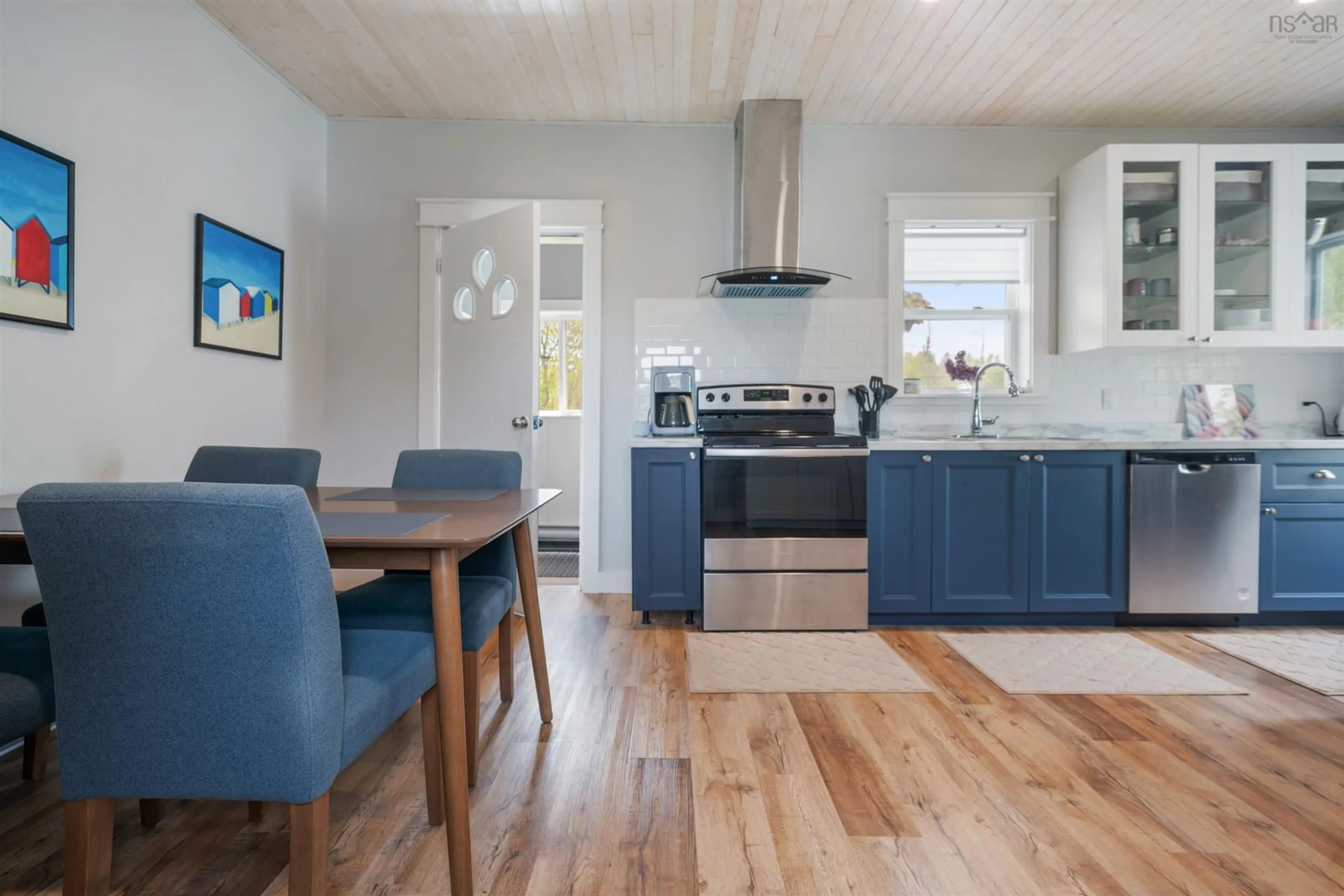 Open concept kitchen, wood/laminate floor for 1720 Acadia Ave, Westville Nova Scotia B0K 2A0