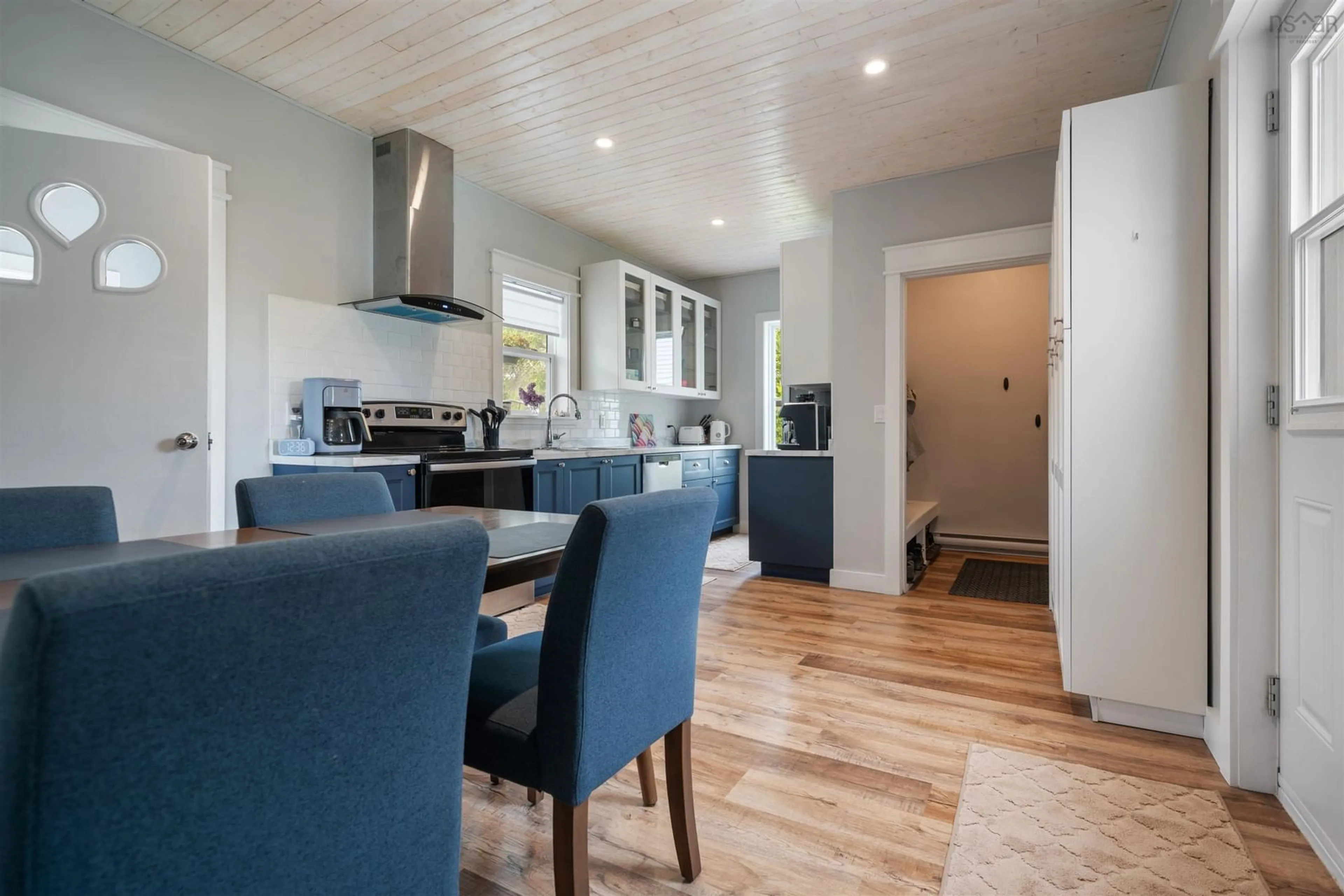 Open concept kitchen, wood/laminate floor for 1720 Acadia Ave, Westville Nova Scotia B0K 2A0