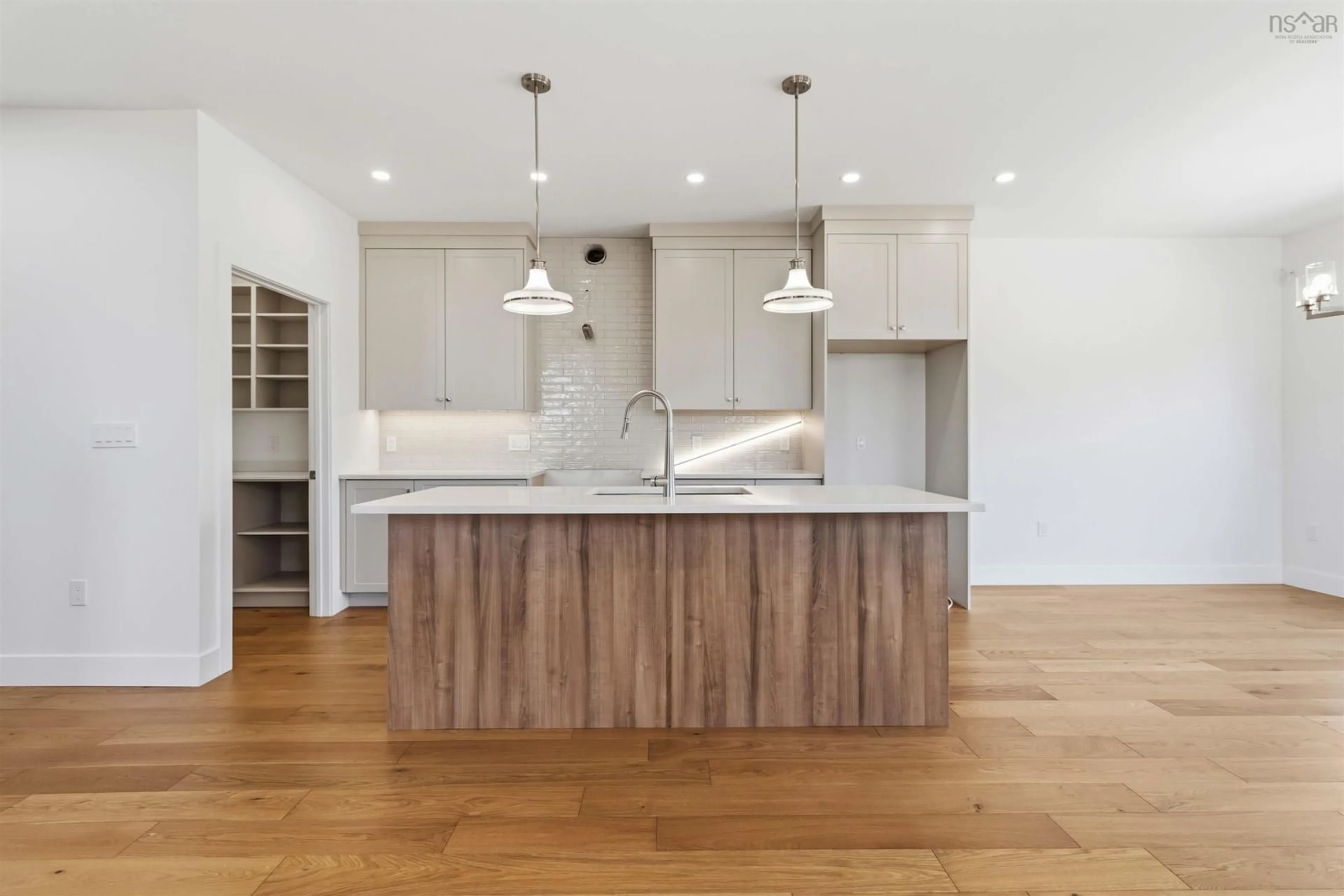 Open concept kitchen, wood/laminate floor for 209 Lewis Dr #LW14, Bedford Nova Scotia B4B 0L3