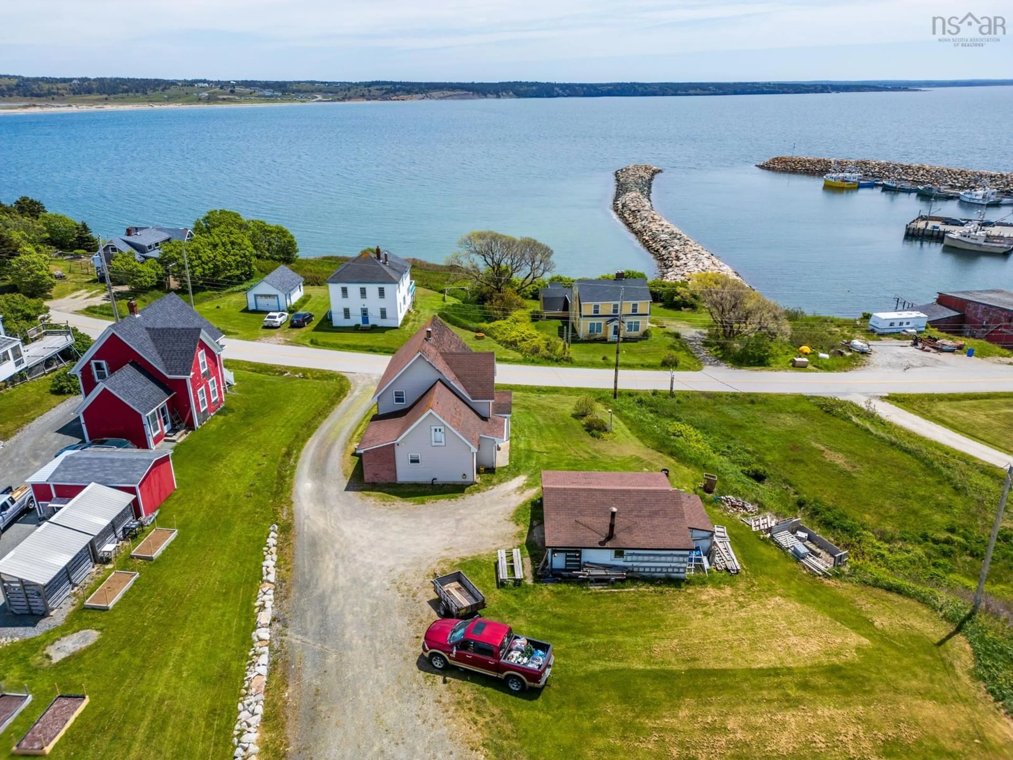 A pic from outside/outdoor area/front of a property/back of a property/a pic from drone, water/lake/river/ocean view for 496 Cape St. Mary Rd, Cape St Marys Nova Scotia B5A 5B4