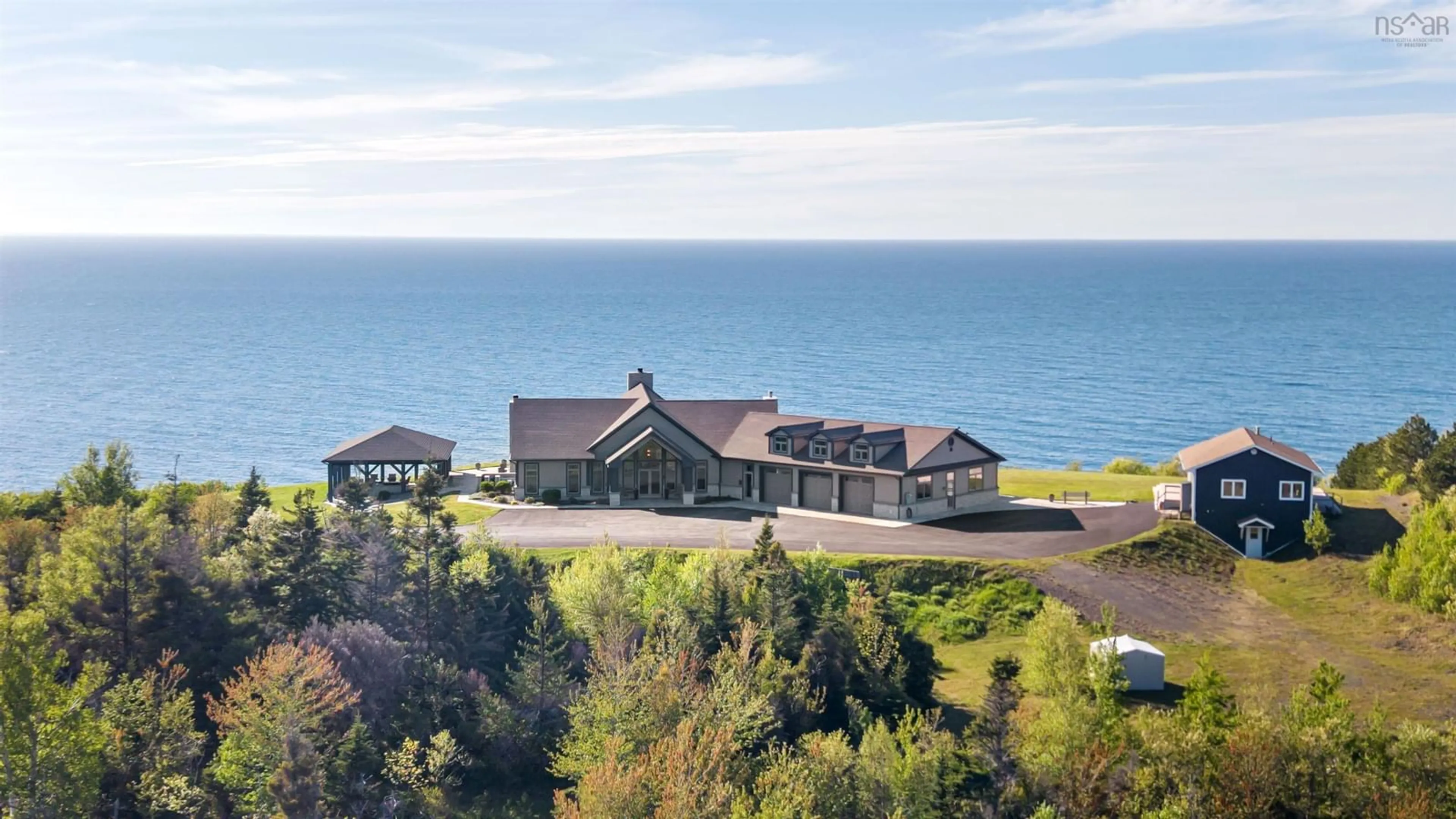 A pic from outside/outdoor area/front of a property/back of a property/a pic from drone, water/lake/river/ocean view for 8482 Highway 337, Georgeville Nova Scotia B2G 2L1