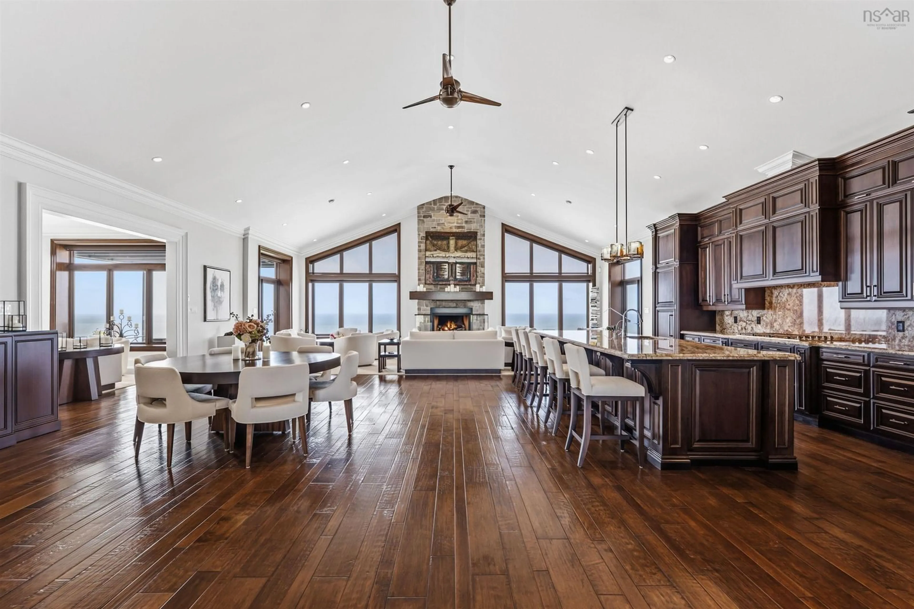 Open concept kitchen, wood/laminate floor for 8482 Highway 337, Georgeville Nova Scotia B2G 2L1