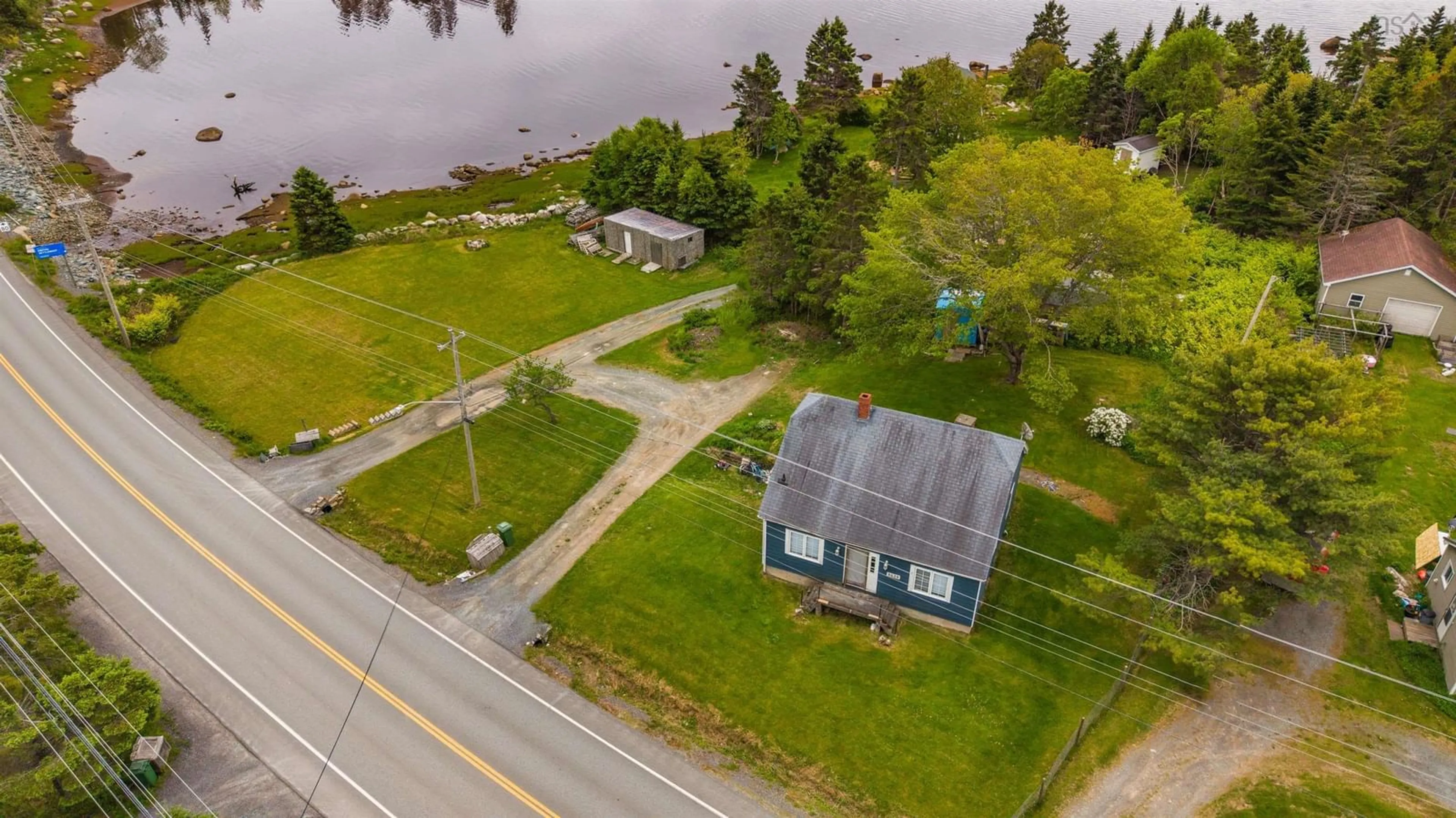 A pic from outside/outdoor area/front of a property/back of a property/a pic from drone, water/lake/river/ocean view for 8628 Highway 7 Hwy, Musquodoboit Harbour Nova Scotia B0J 2L0
